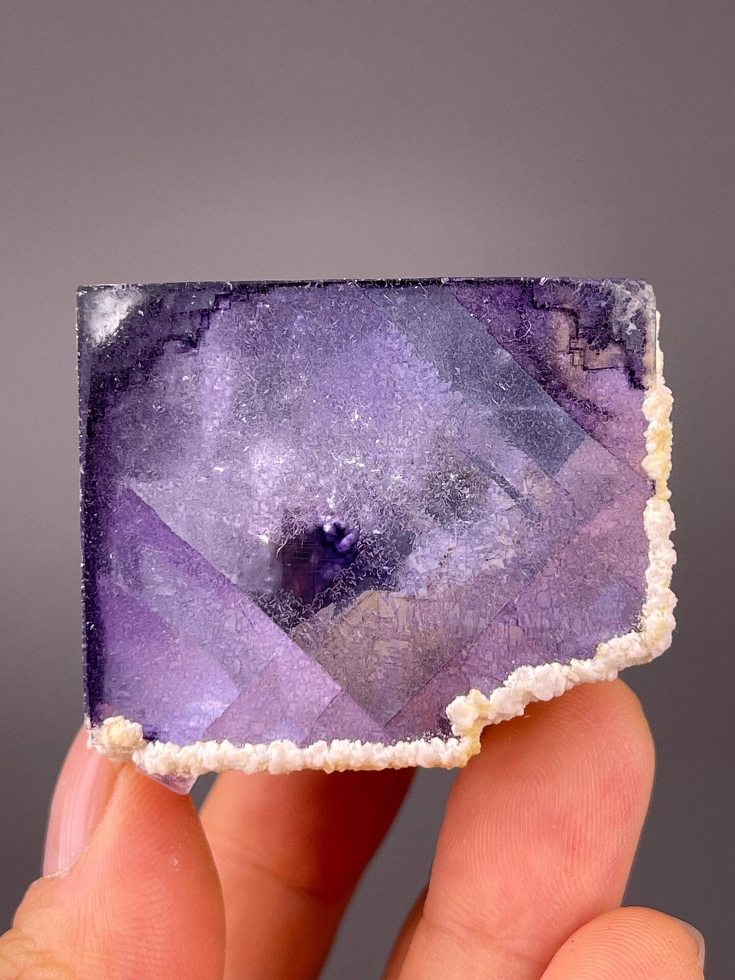 Fluorite purple phantom zones visible through crystal clarity