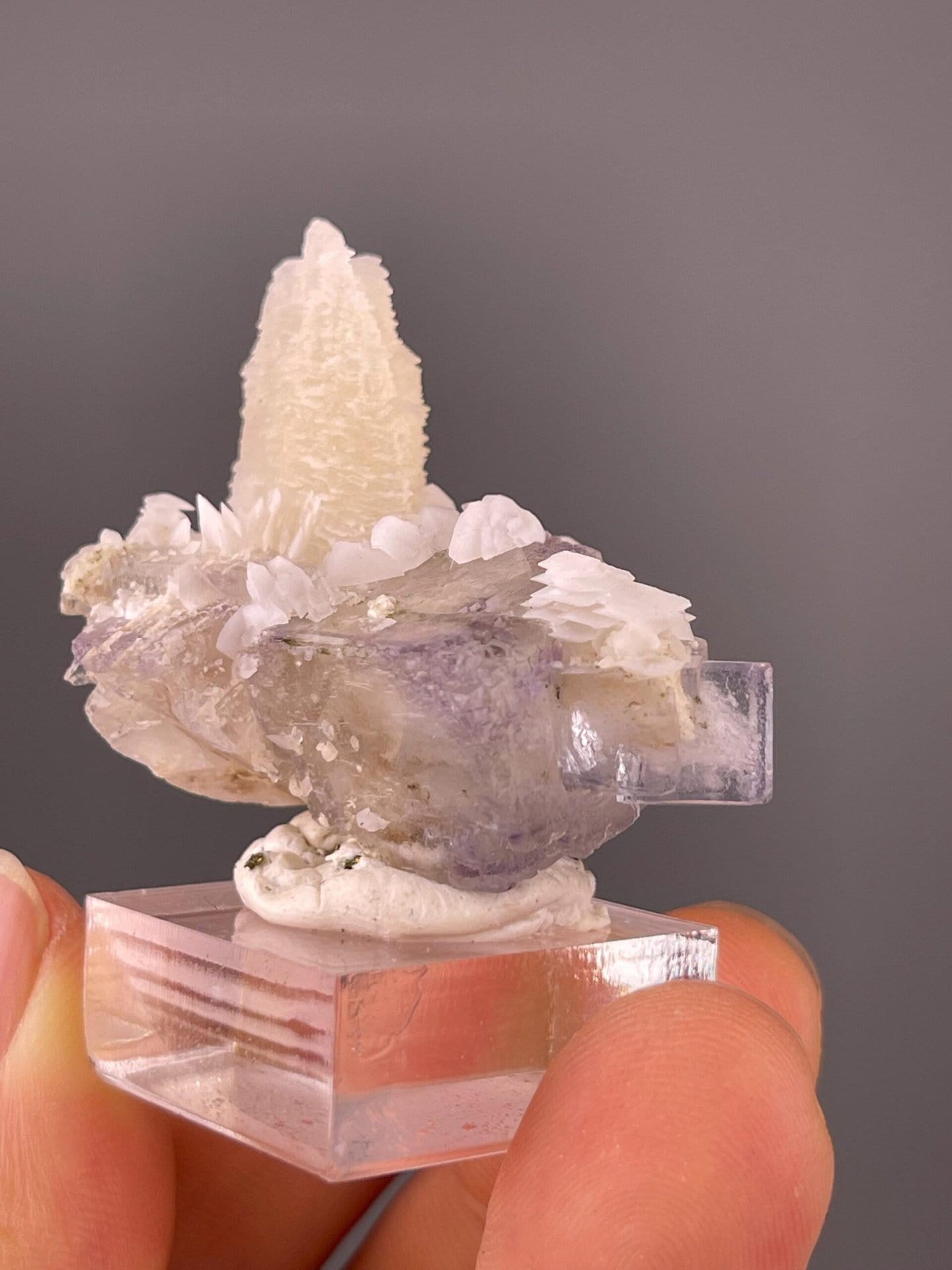 Close-up of pagoda calcite formation on fluorite matrix