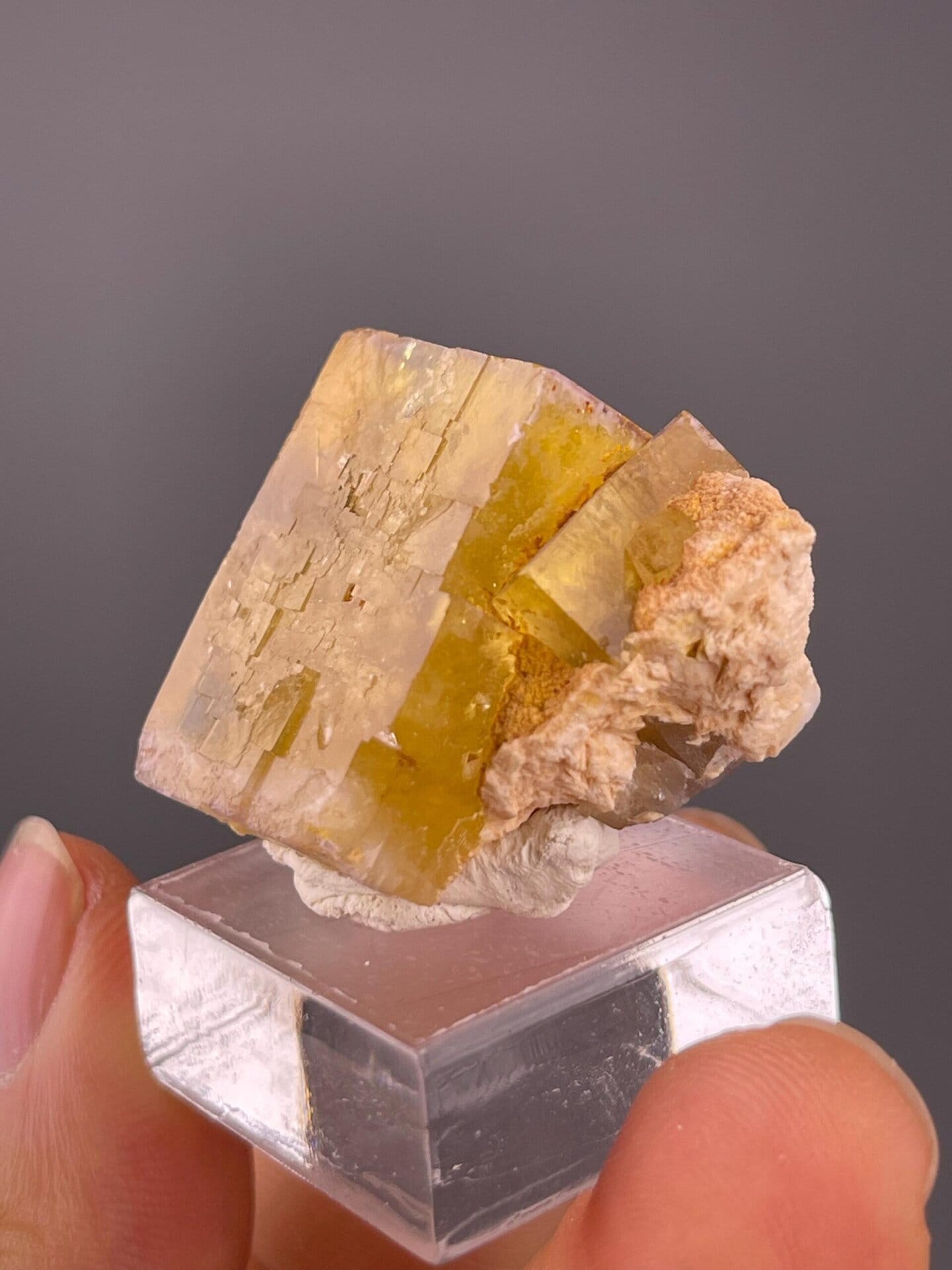 Light through yellow fluorite cube showing clarity