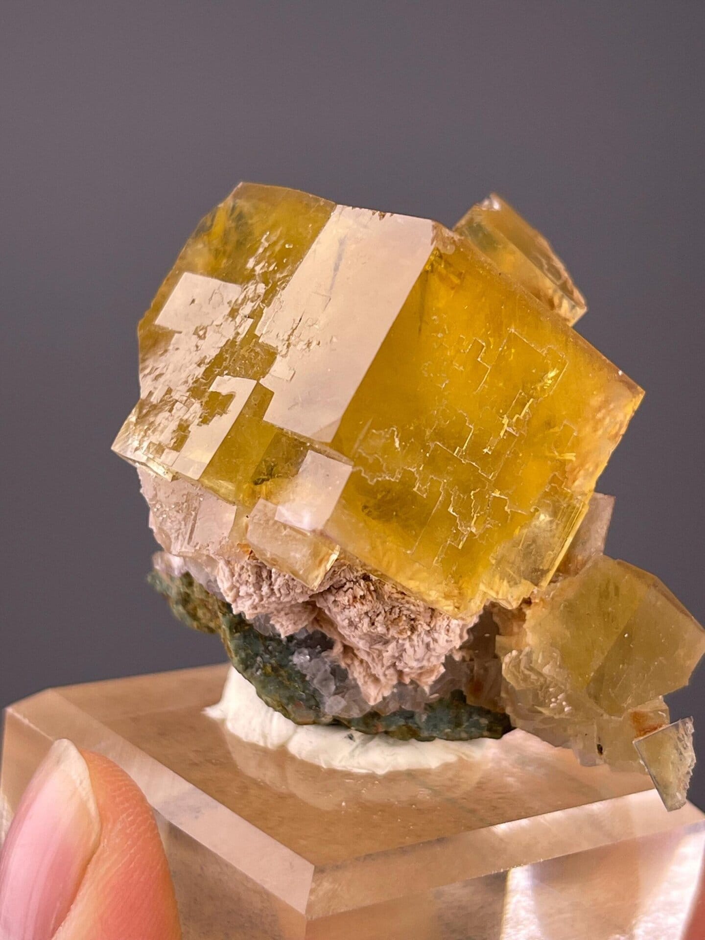 Yellow fluorite cluster displaying vitreous luster
