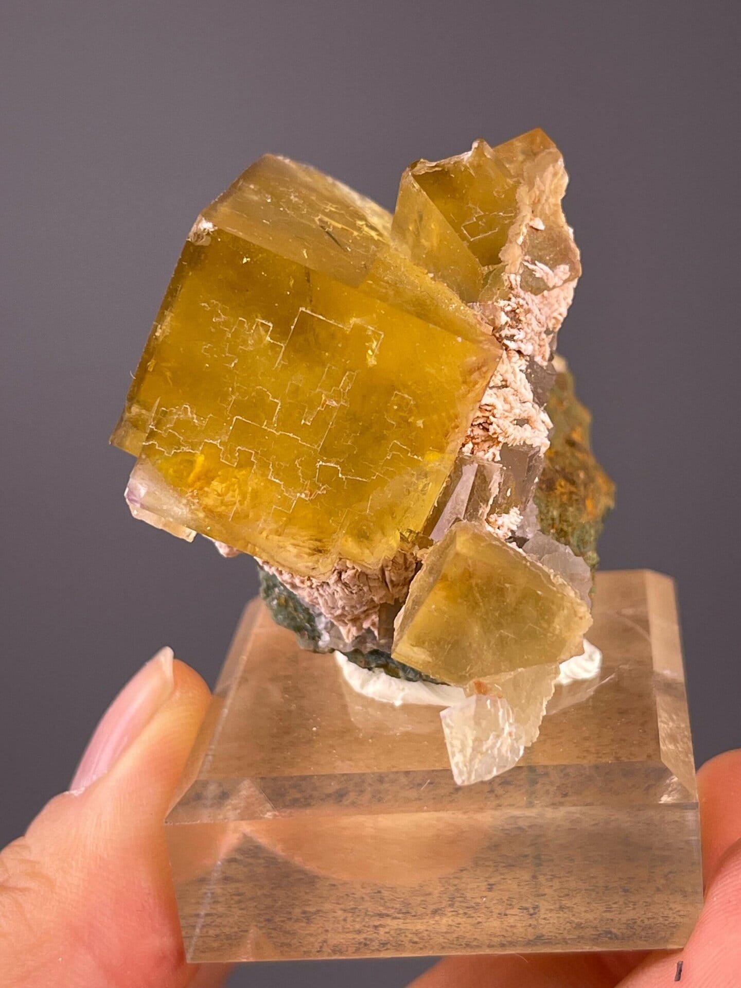 Rear view of yellow fluorite crystal cluster, China