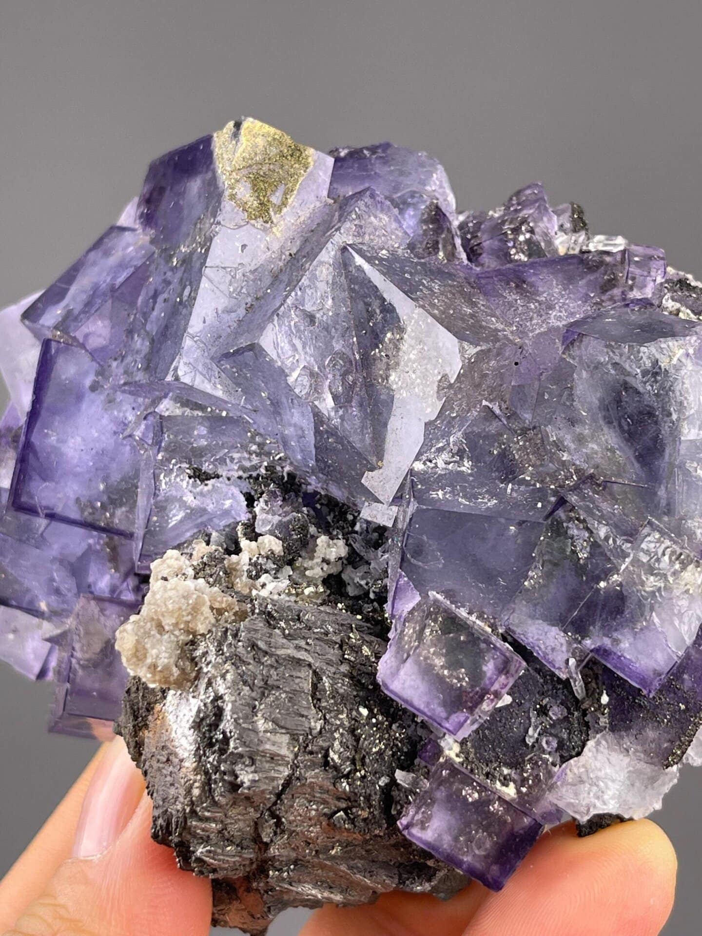 Purple phantom fluorite with pyrite measuring 3.8×3.3×1.4 inches