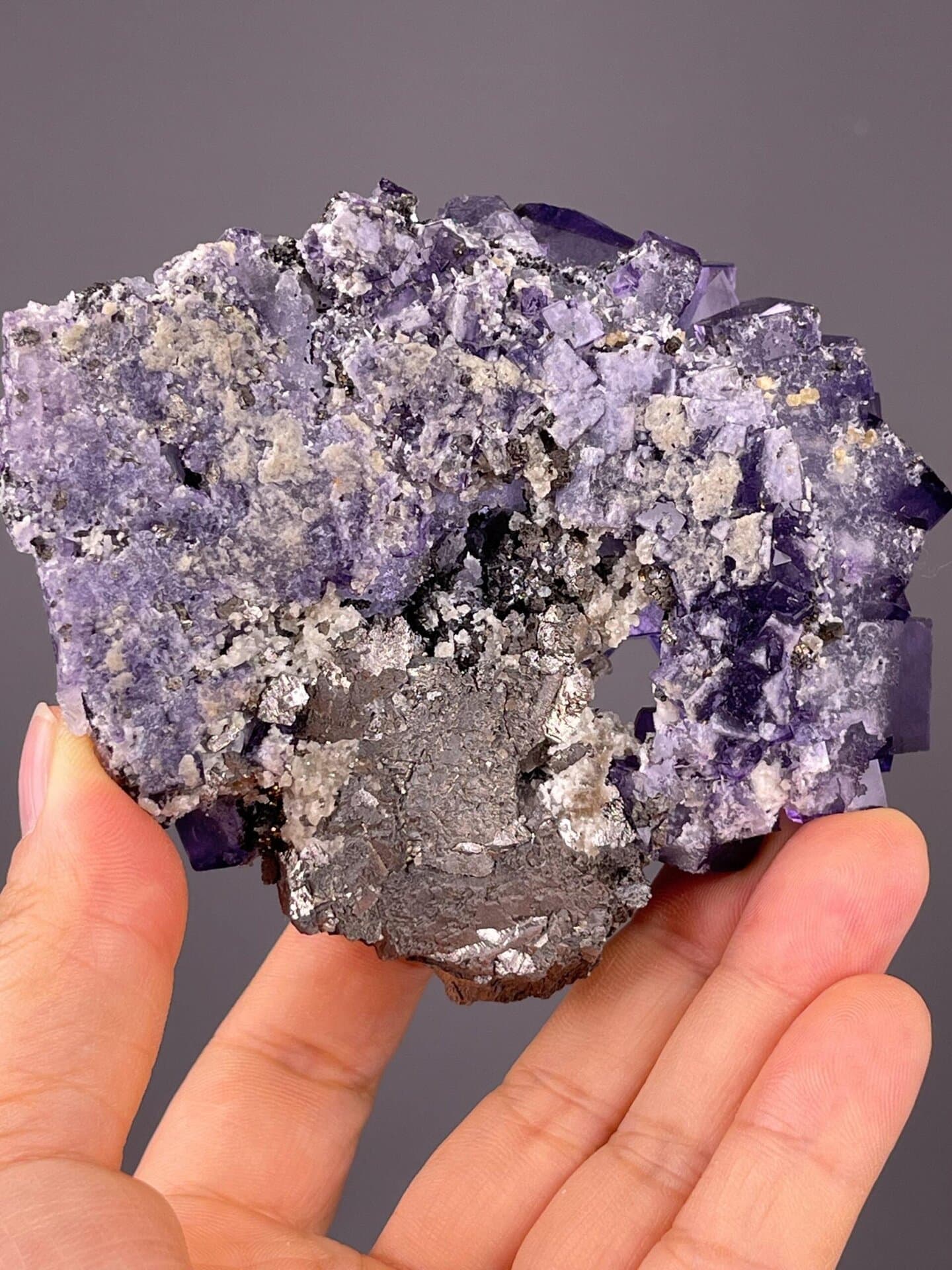 Translucent cubic purple phantom fluorite from Yaogangxian Mine