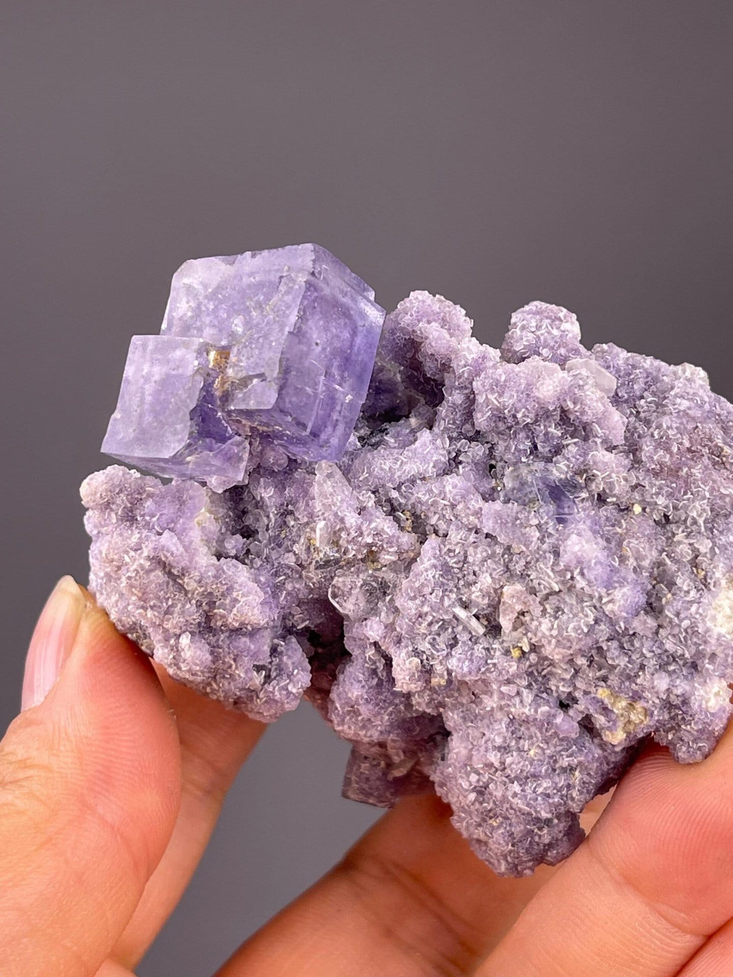 Purple fluorite cluster with mica from Yaogangxian, Hunan