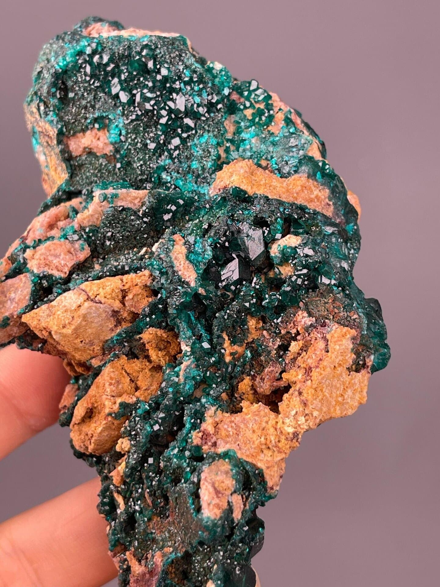 Copper silicate dioptase with emerald green color on matrix