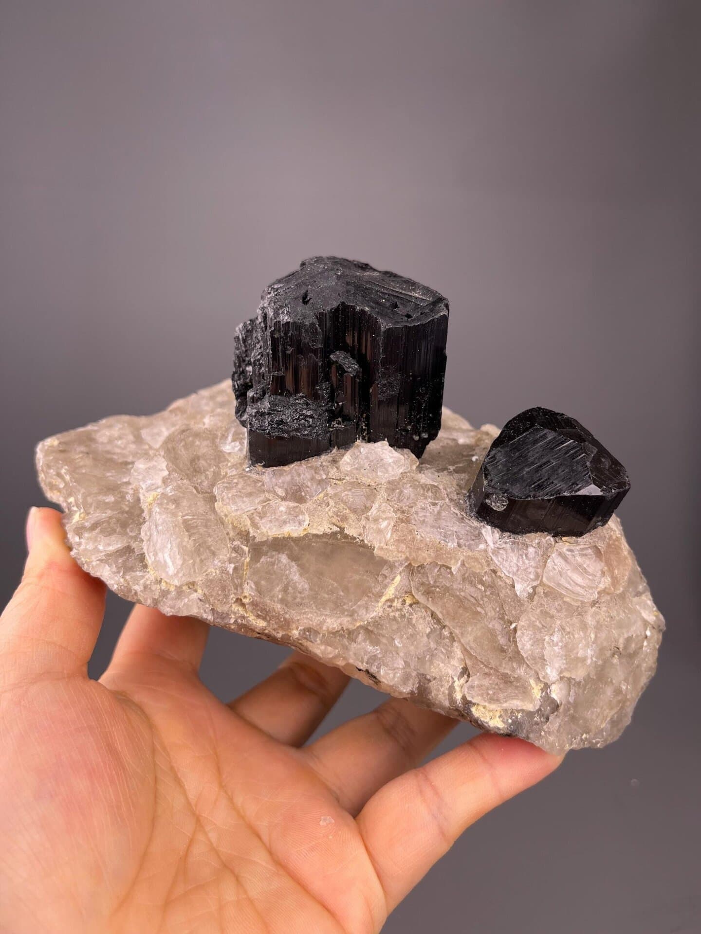 Black tourmaline with characteristic vertical striations on prisms