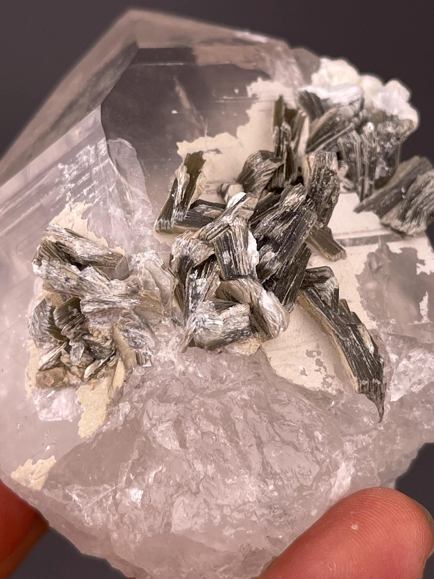 Silver mica books and rosettes on crystalline quartz matrix