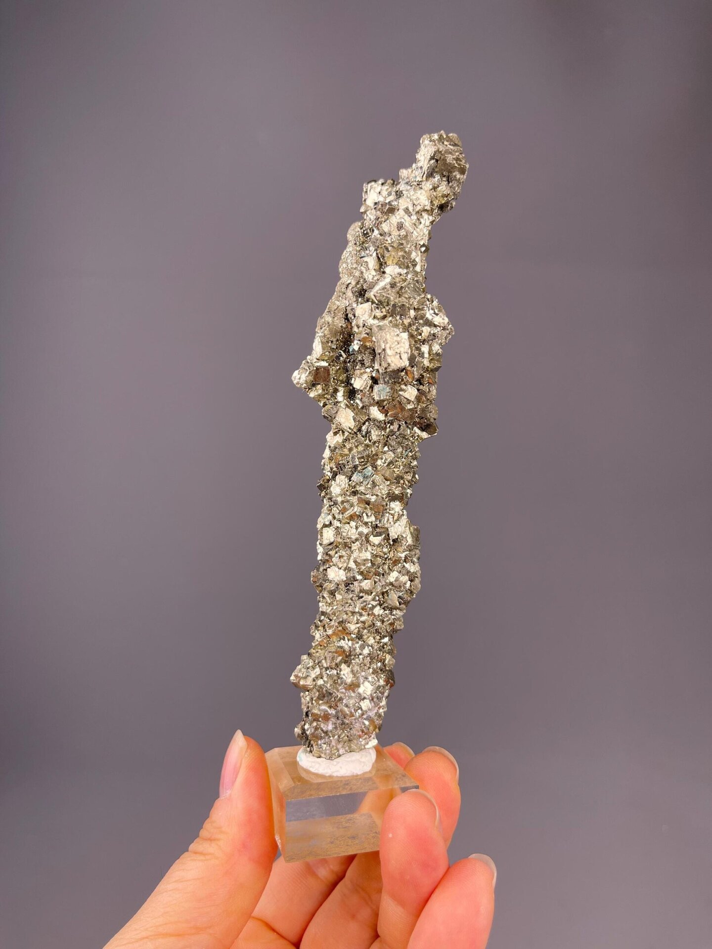 Pyrite with bright metallic luster in columnar form