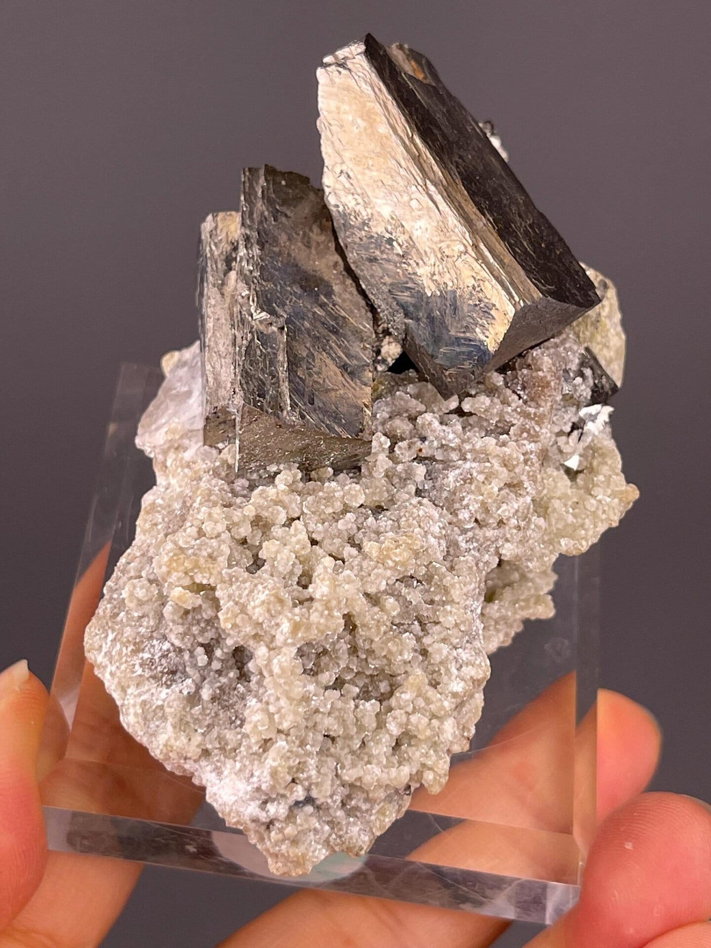 Tetragonal chalcopyrite crystal mass on quartz matrix base