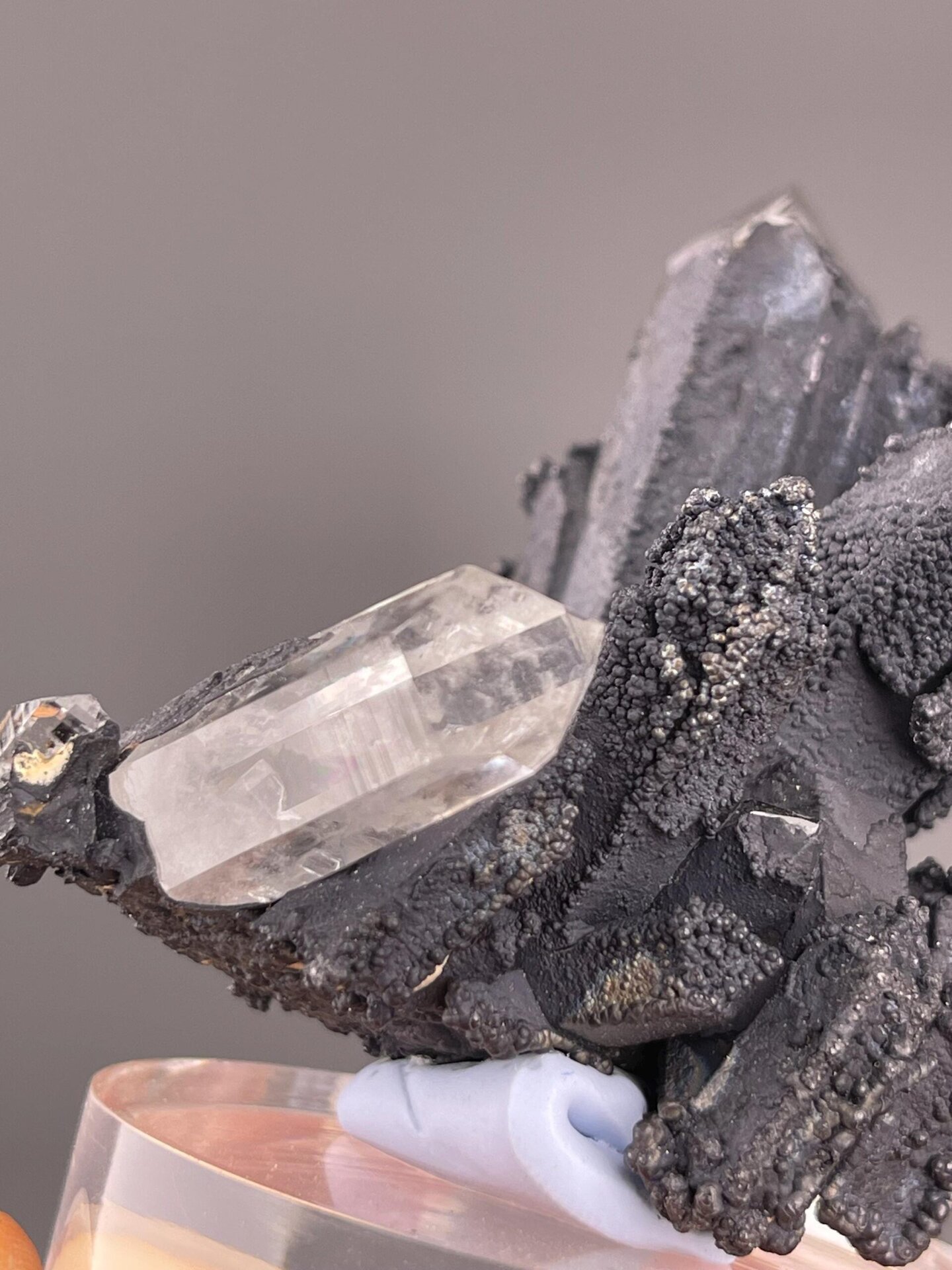 Namibian psilomelane with associated clear quartz crystals