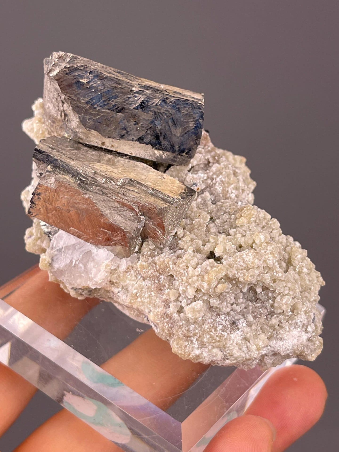 Sulfide mineral specimen with brassy iridescent chalcopyrite