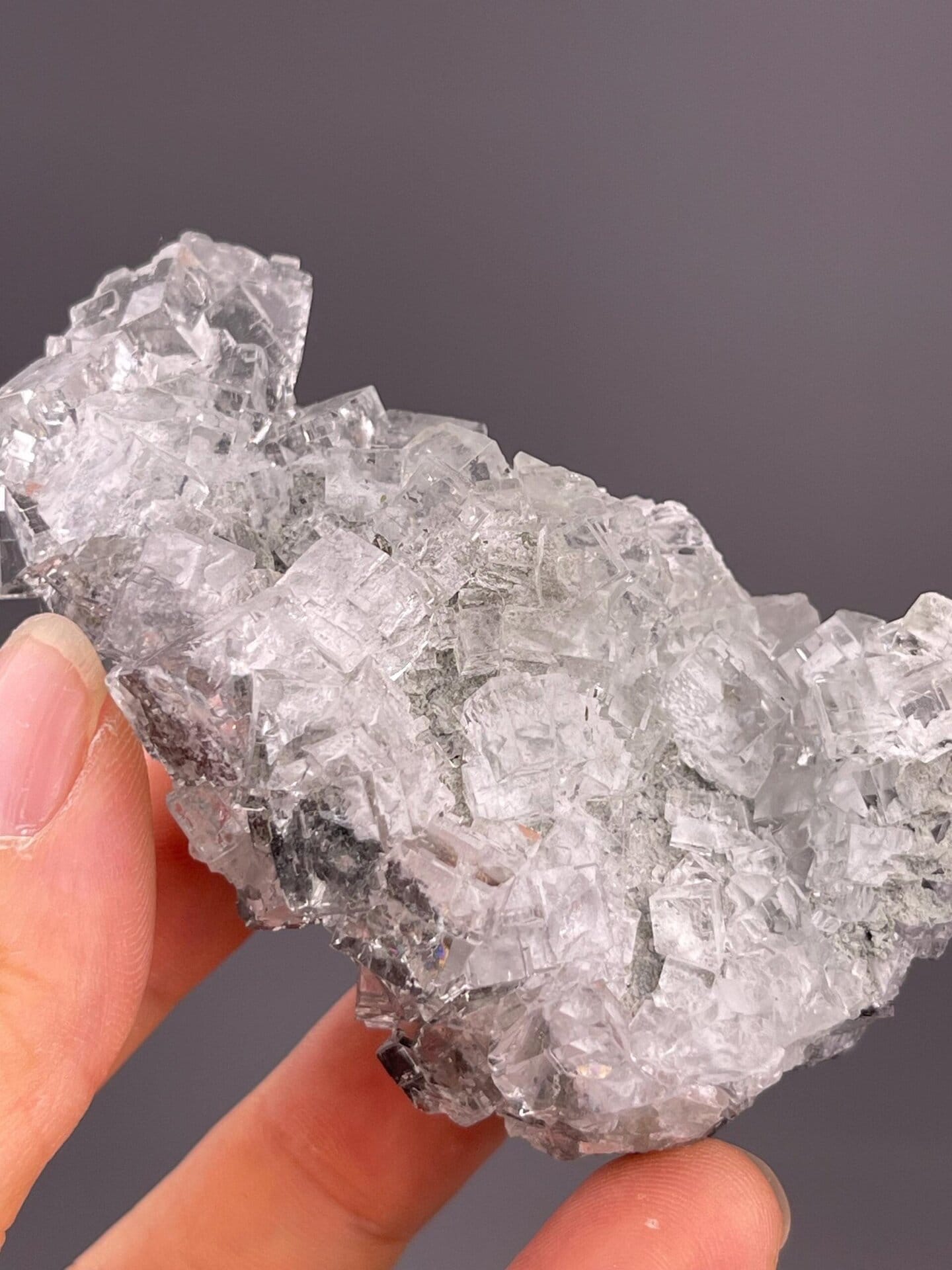 Cubic fluorite cluster with glassy transparency and sharp edges