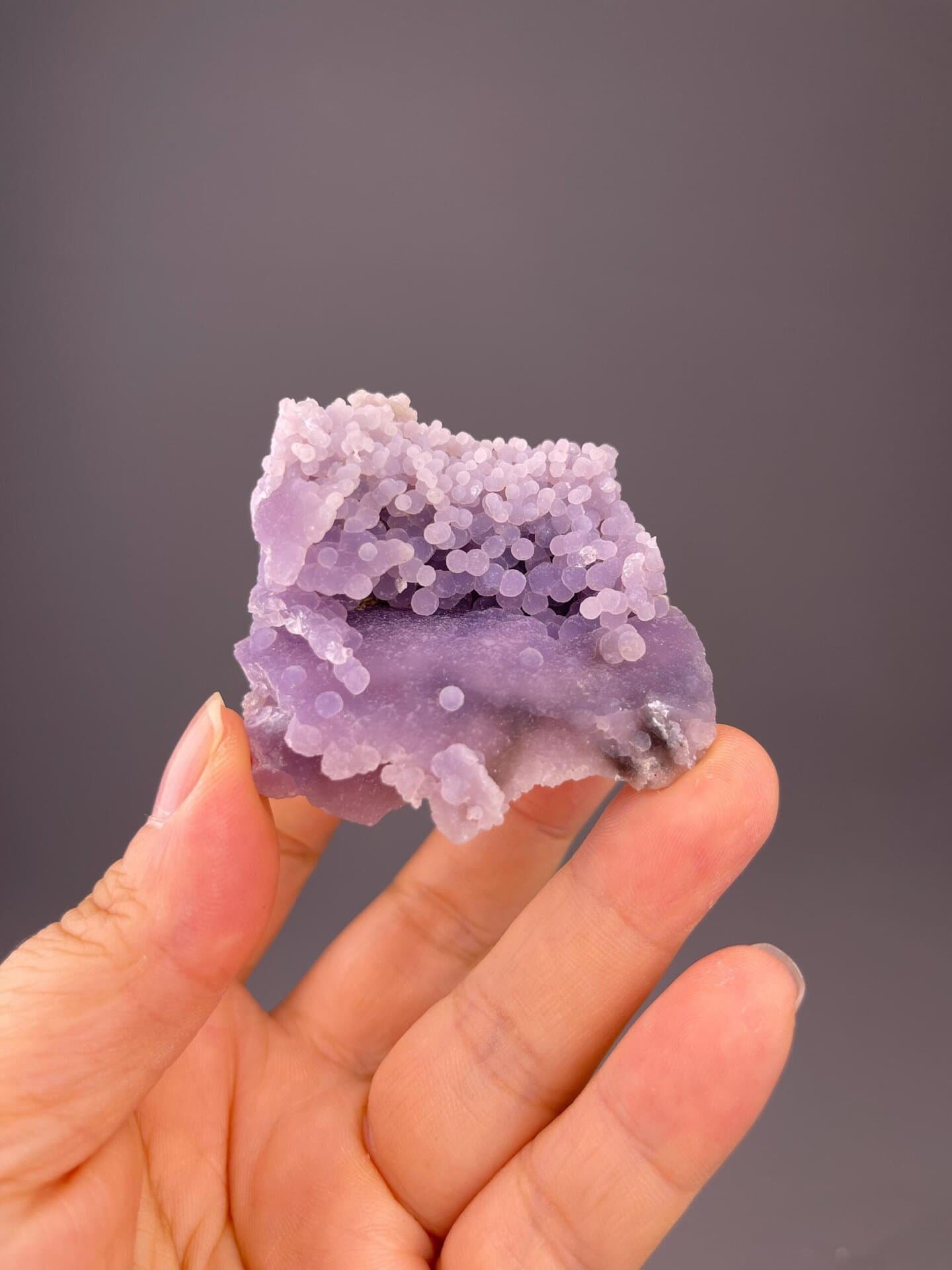 Front view of grape agate showing dense grape-like botryoidal form
