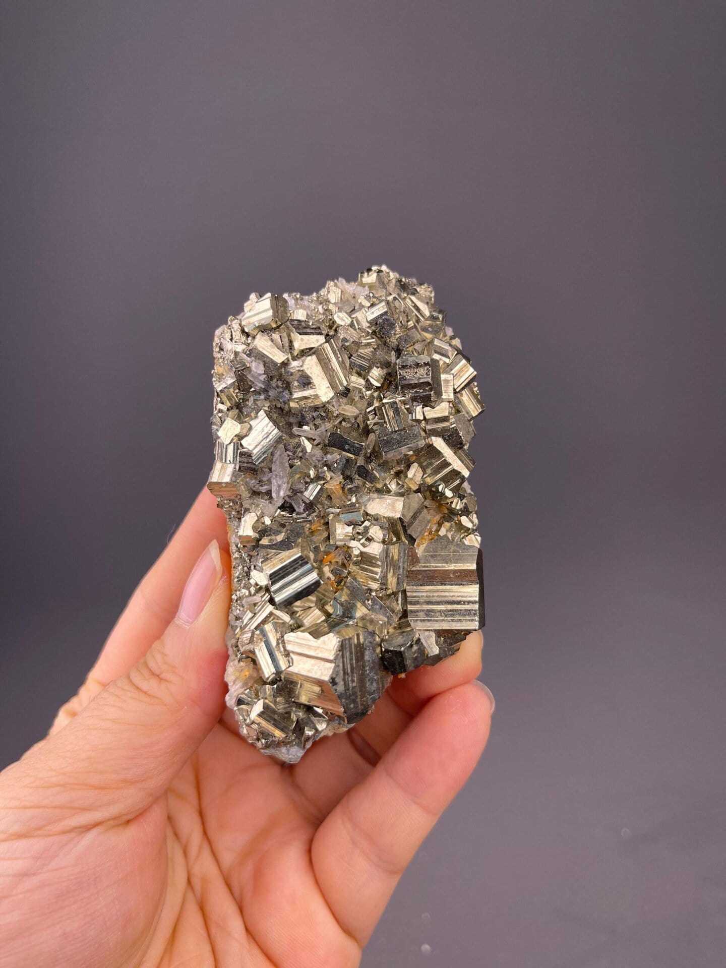 Front view of cubic pyrite showing perfect cube geometry