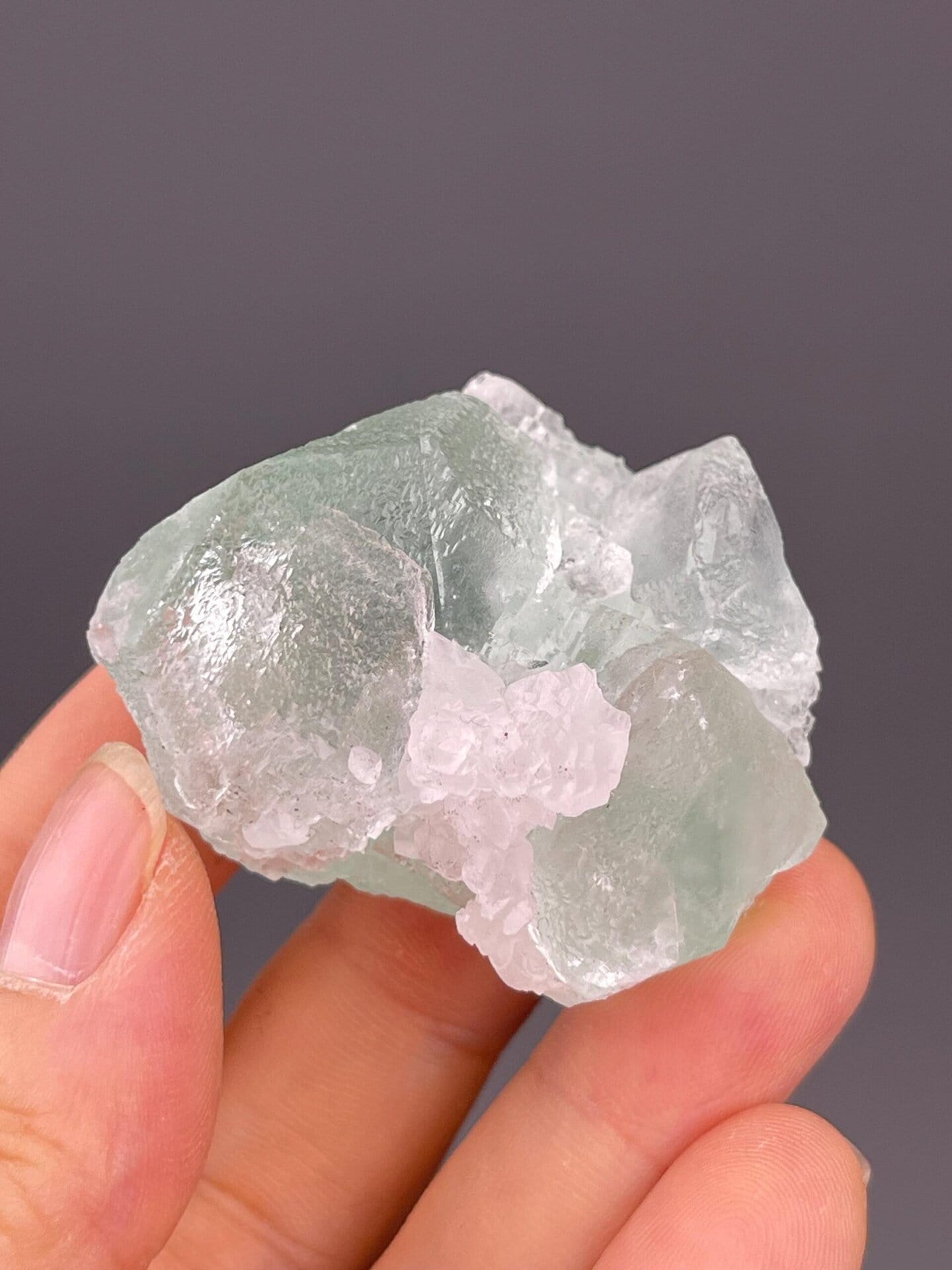 Rare mint green fluorite with calcite association, China
