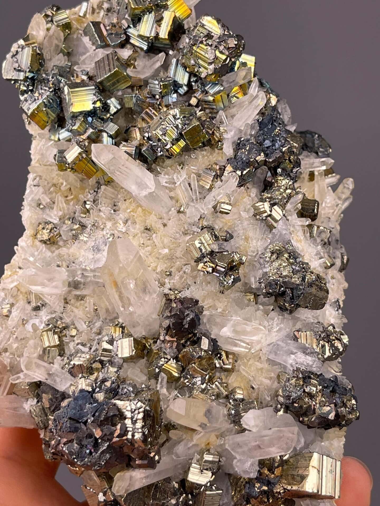 Detail of pyrite cube faces showing natural metallic reflectivity