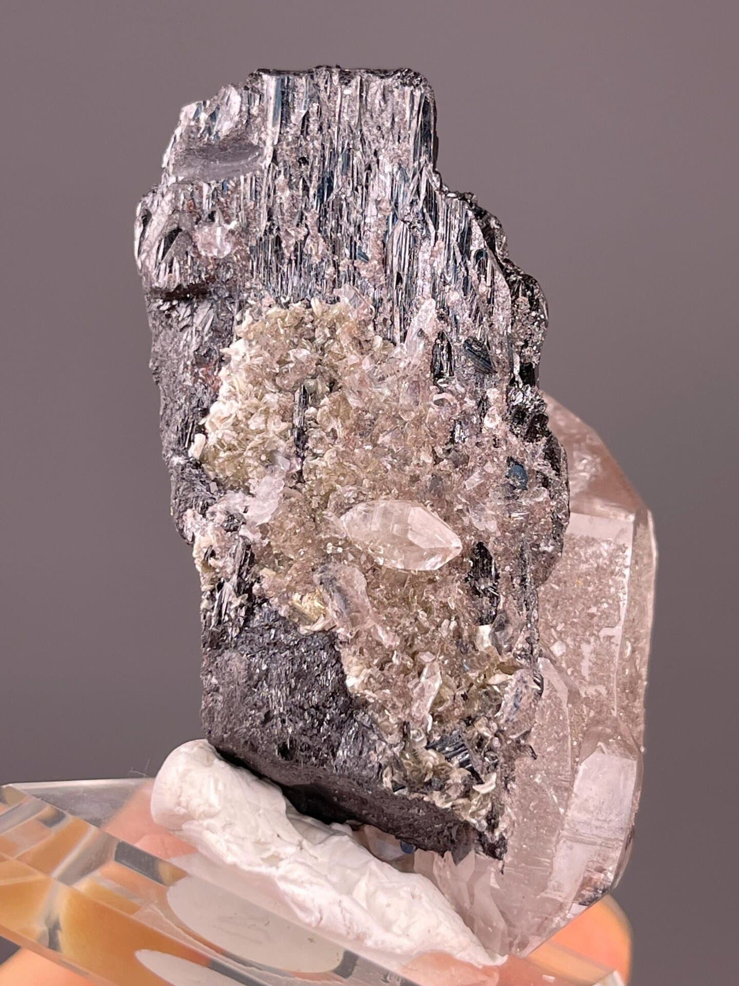 Angled view of cassiterite and quartz specimen