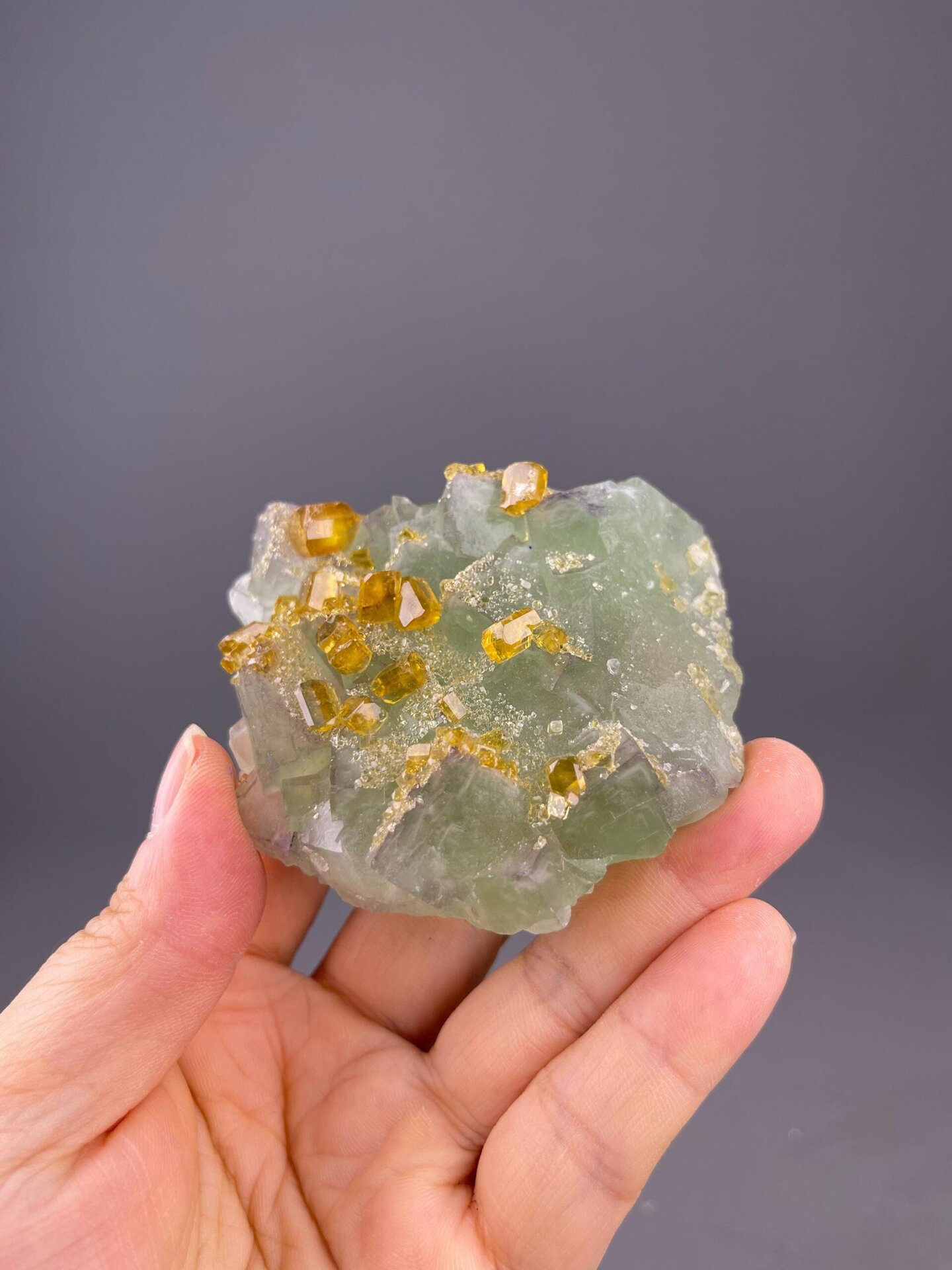 Angled view showing yellow barite against green fluorite
