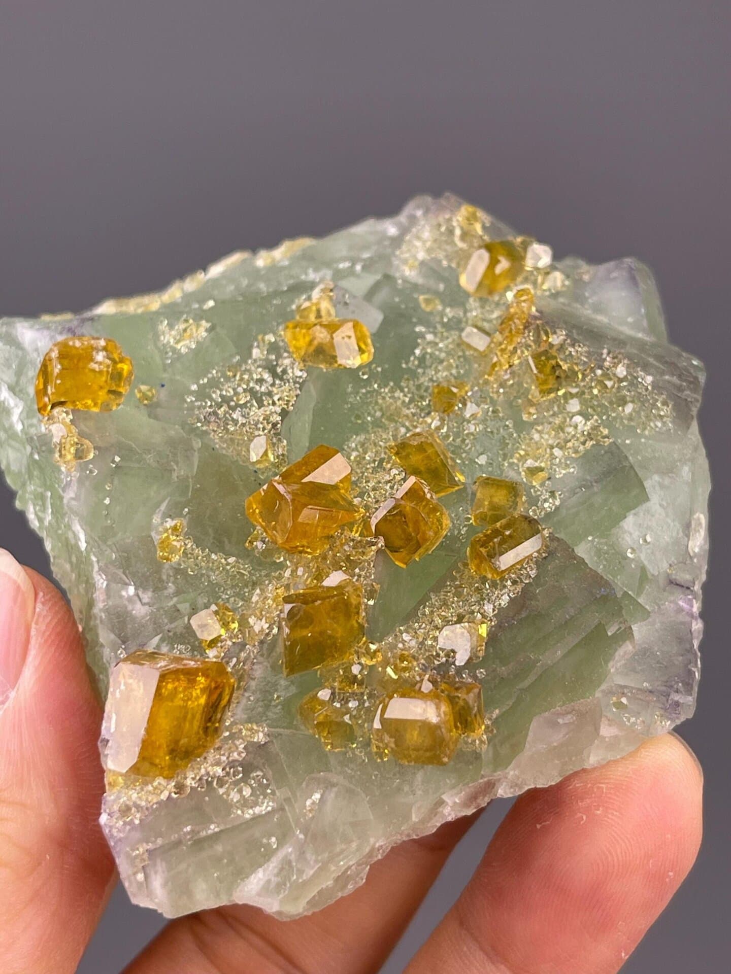 Back view of Jiangxi yellow barite on green fluorite