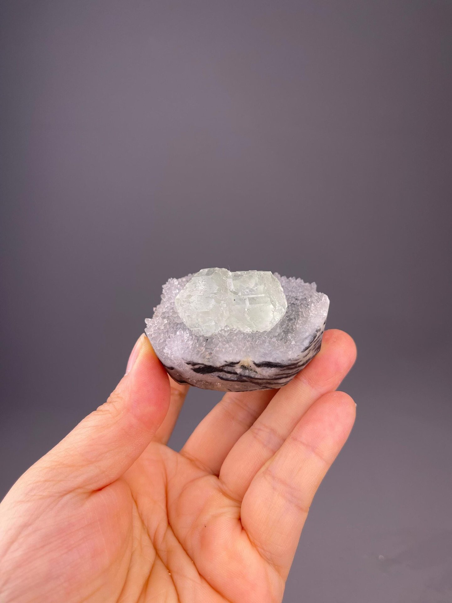 Front view of green fluorite twins showing cubic form