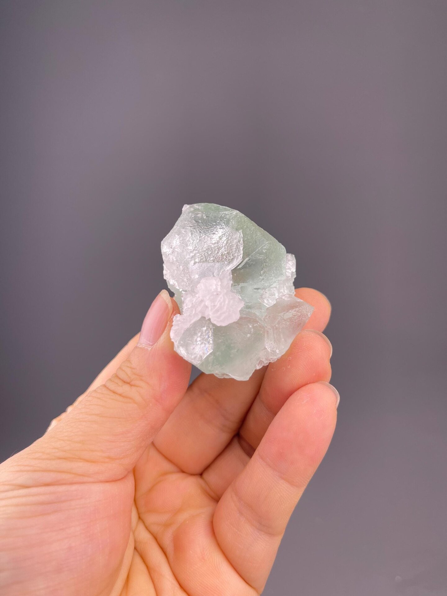 Front view of mint green fluorite showing pale colour