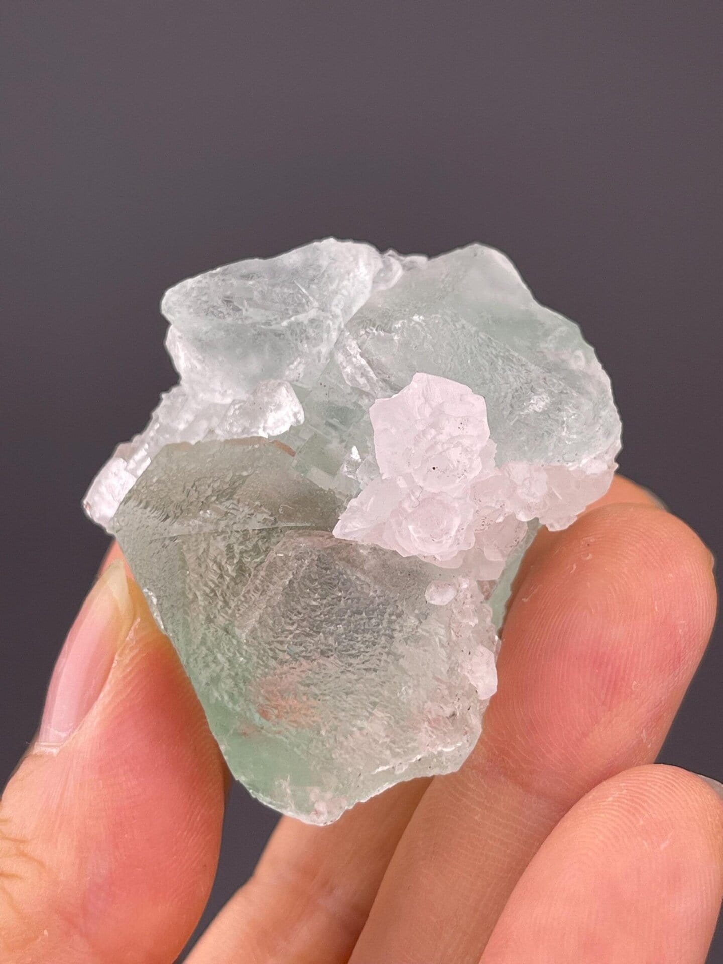 Angled view of mint green fluorite with calcite