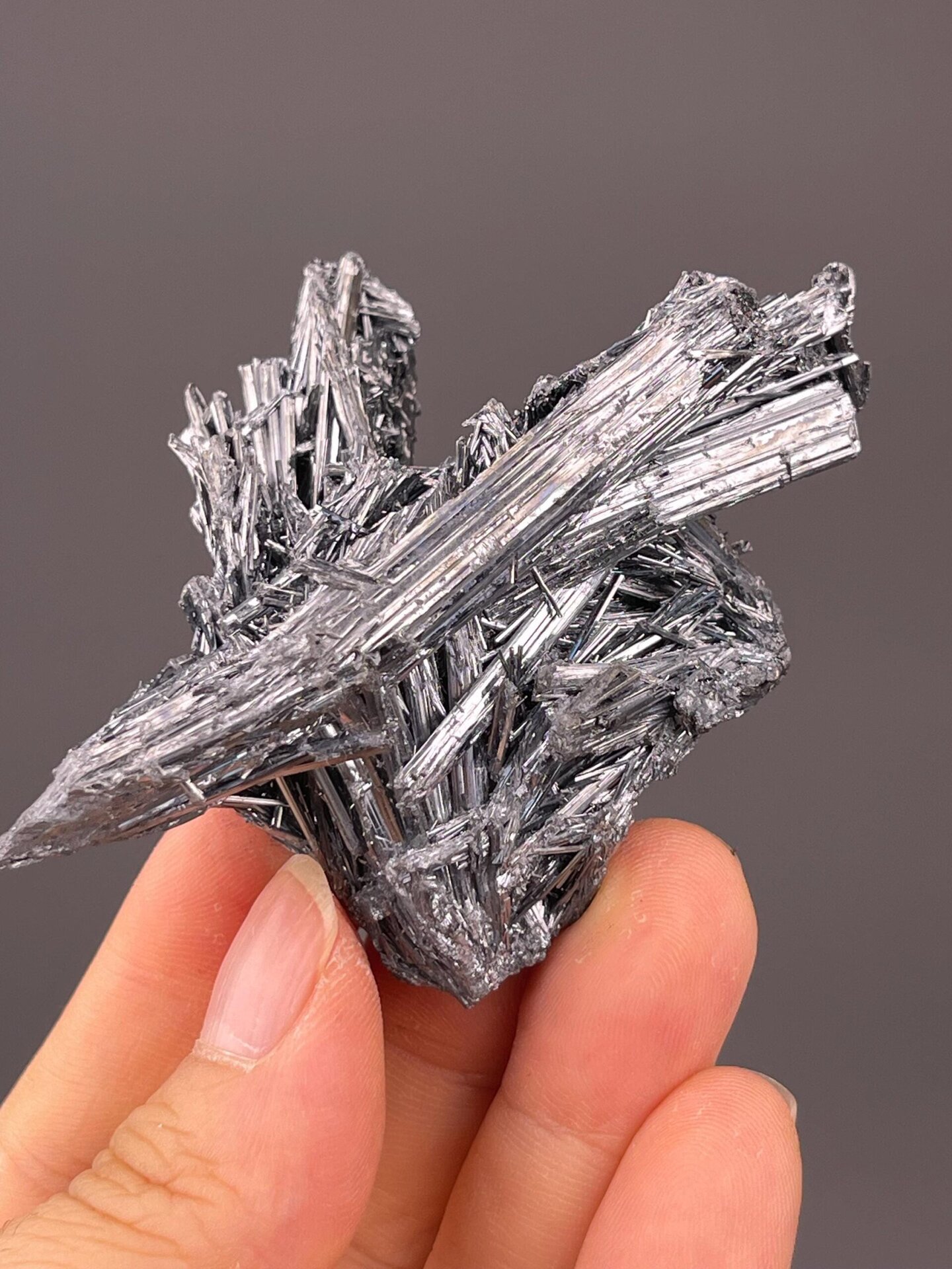 Acicular stibnite crystal cluster with metallic brilliance, Hunan