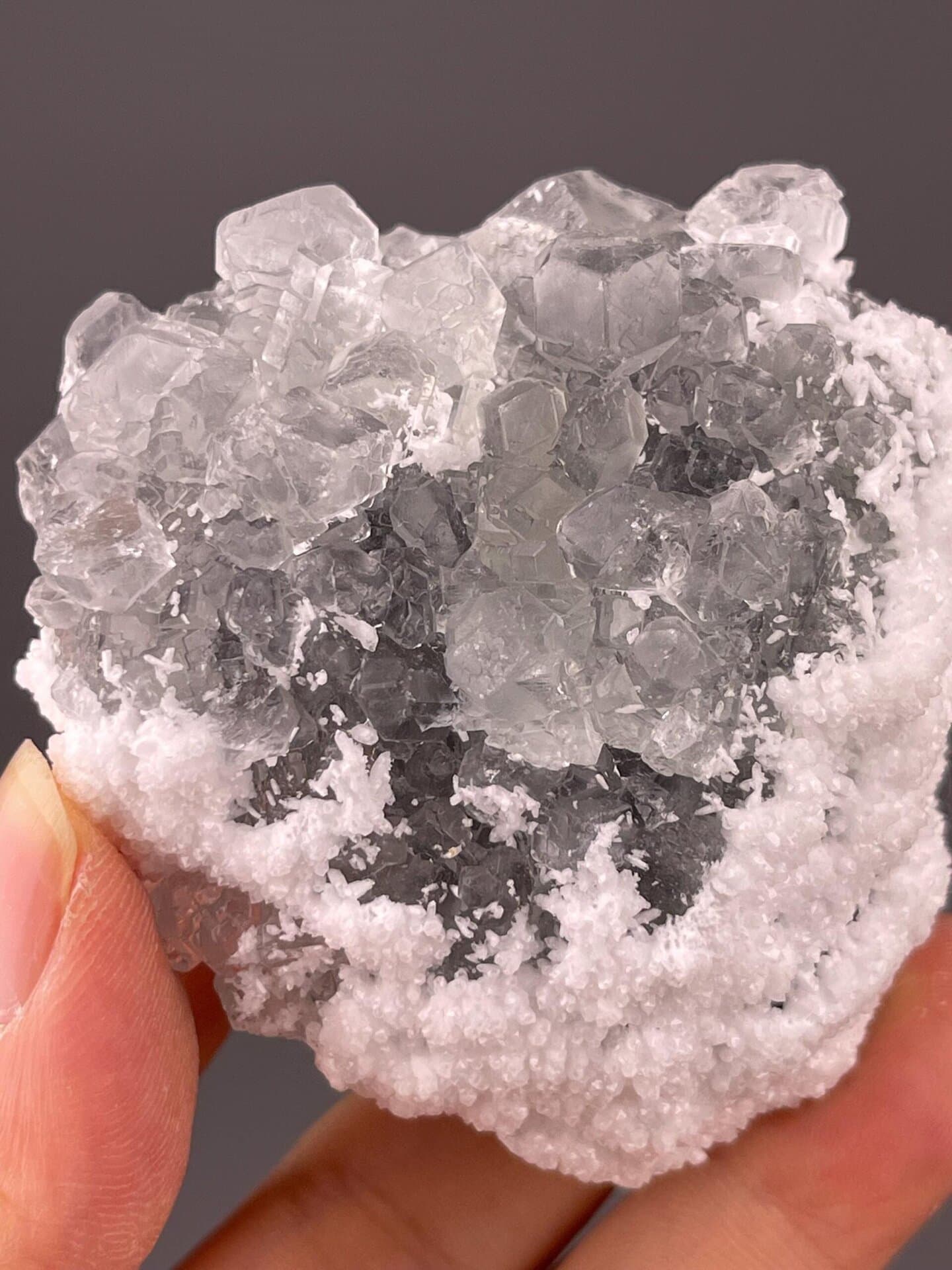 Angled view of sparkling druzy quartz-coated fluorite