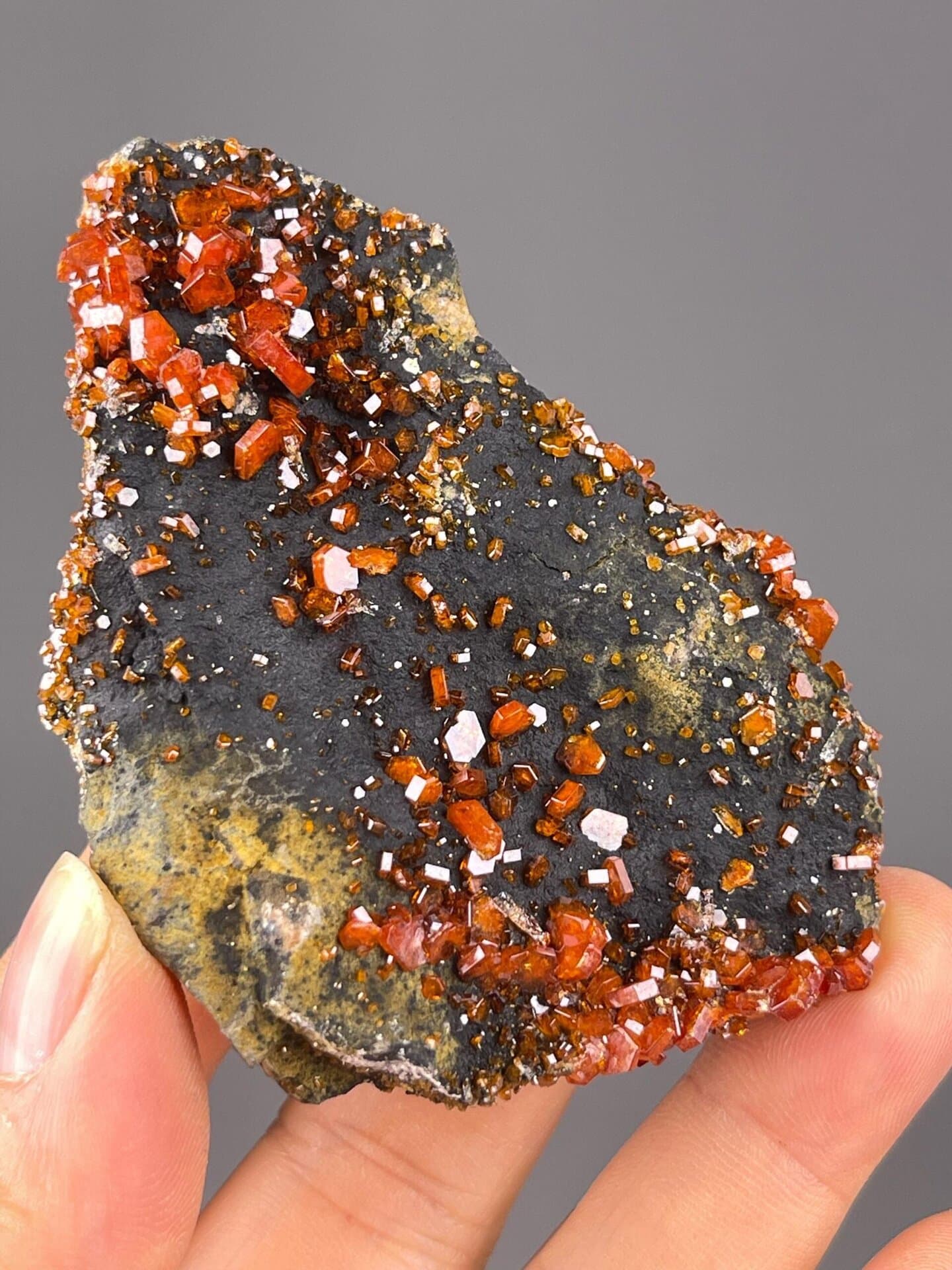 Side view of vanadinite cluster on barite matrix, Morocco