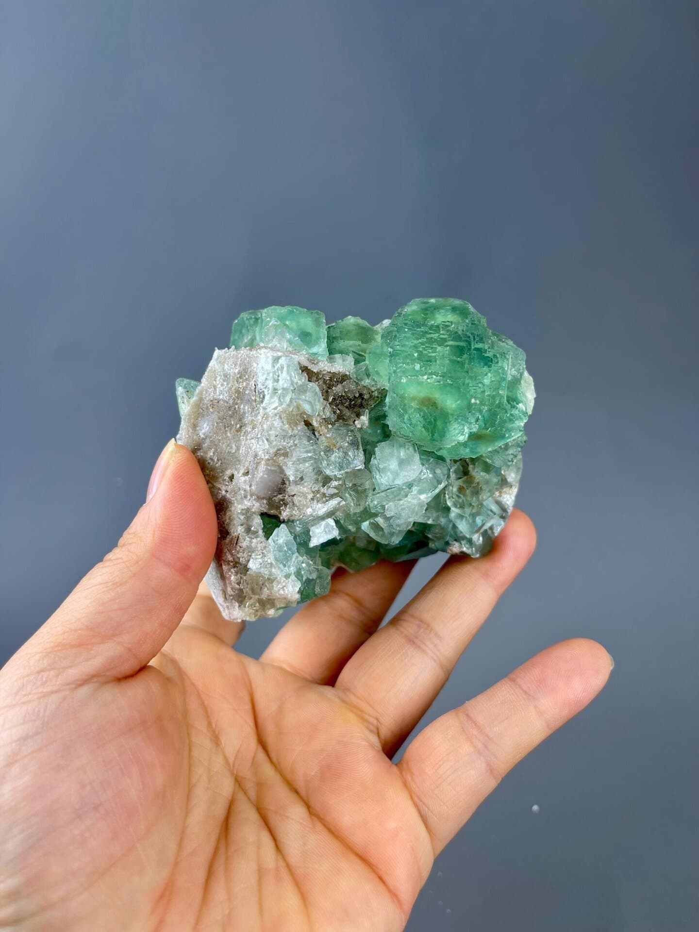 Scale view of 3.5x2.1x2.7 in apple-green fluorite cluster