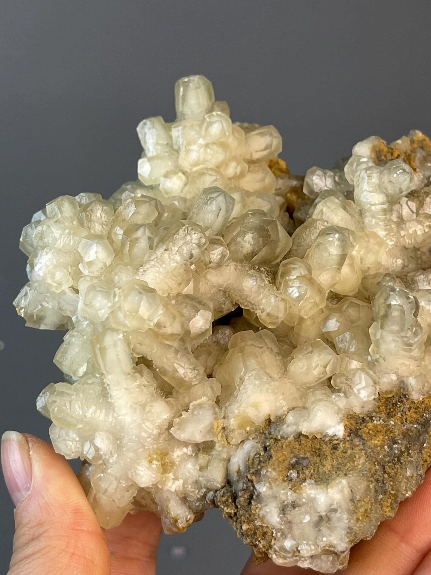 Trigonal calcite in golden flower column habit, China