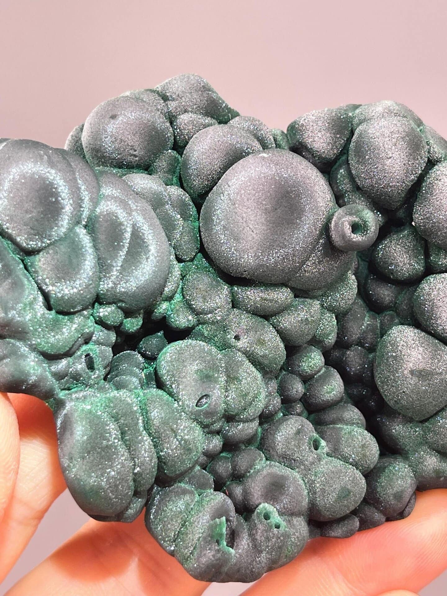 Emerald-green banded malachite clusters on matrix