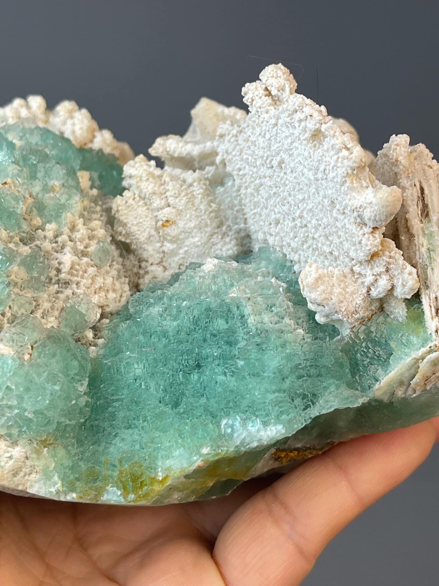 Multiple stepped sphere fluorite formations on matrix
