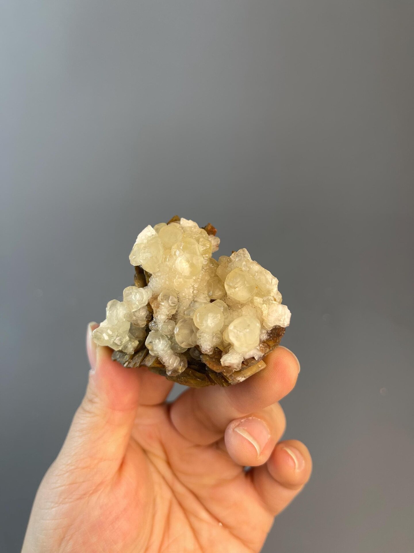 Rounded calcite sphere with unusual droplet habit, China