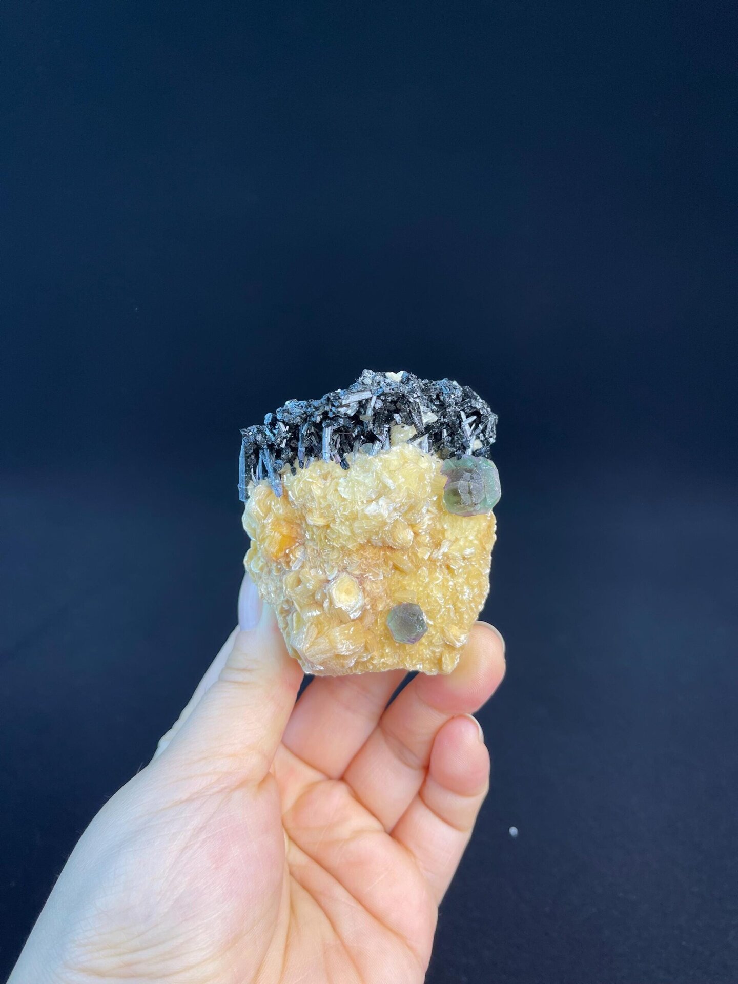 Side view of calcite tourmaline fluorite specimen, Namibia