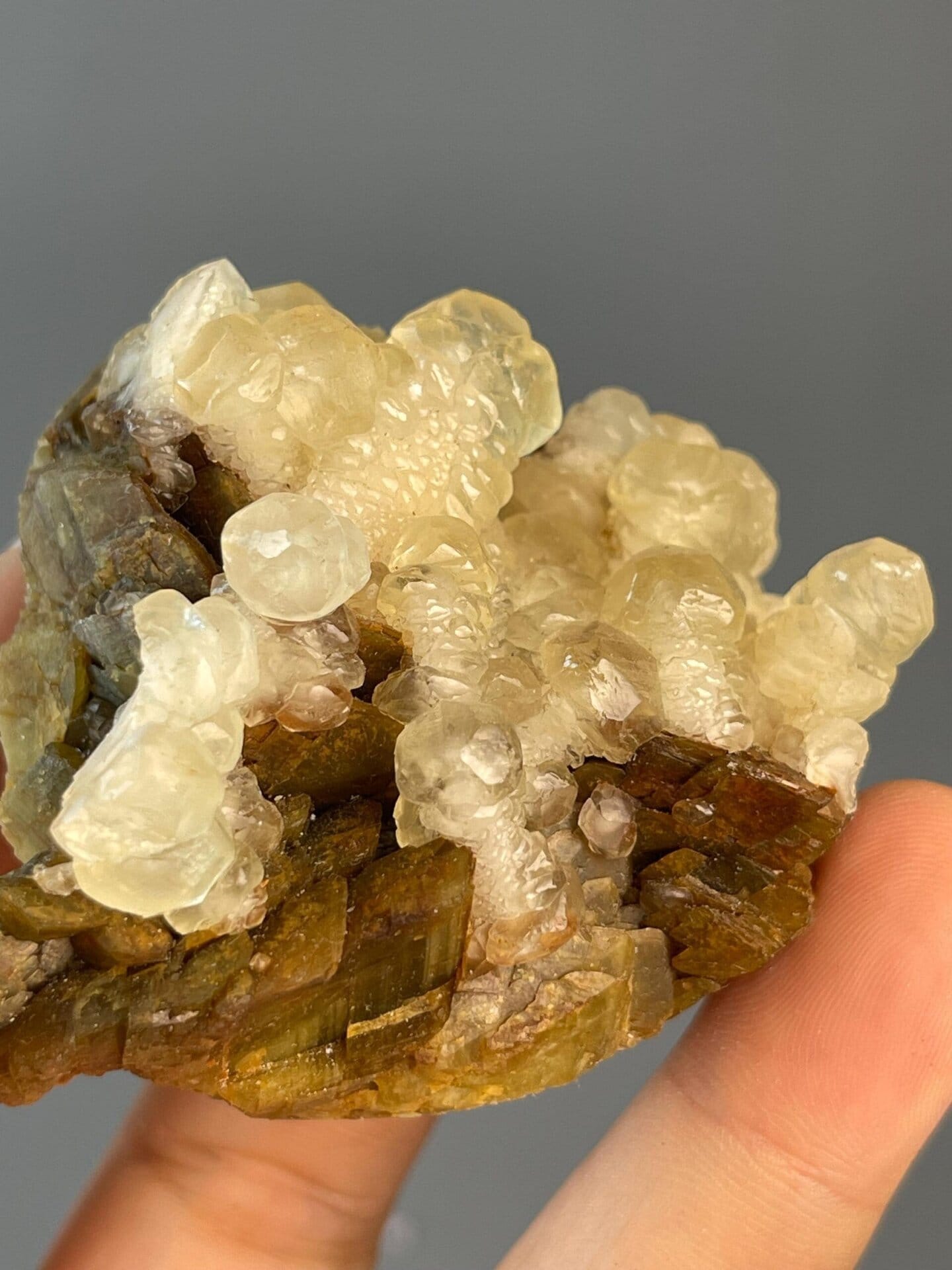 Calcite droplet sphere displaying vitreous luster