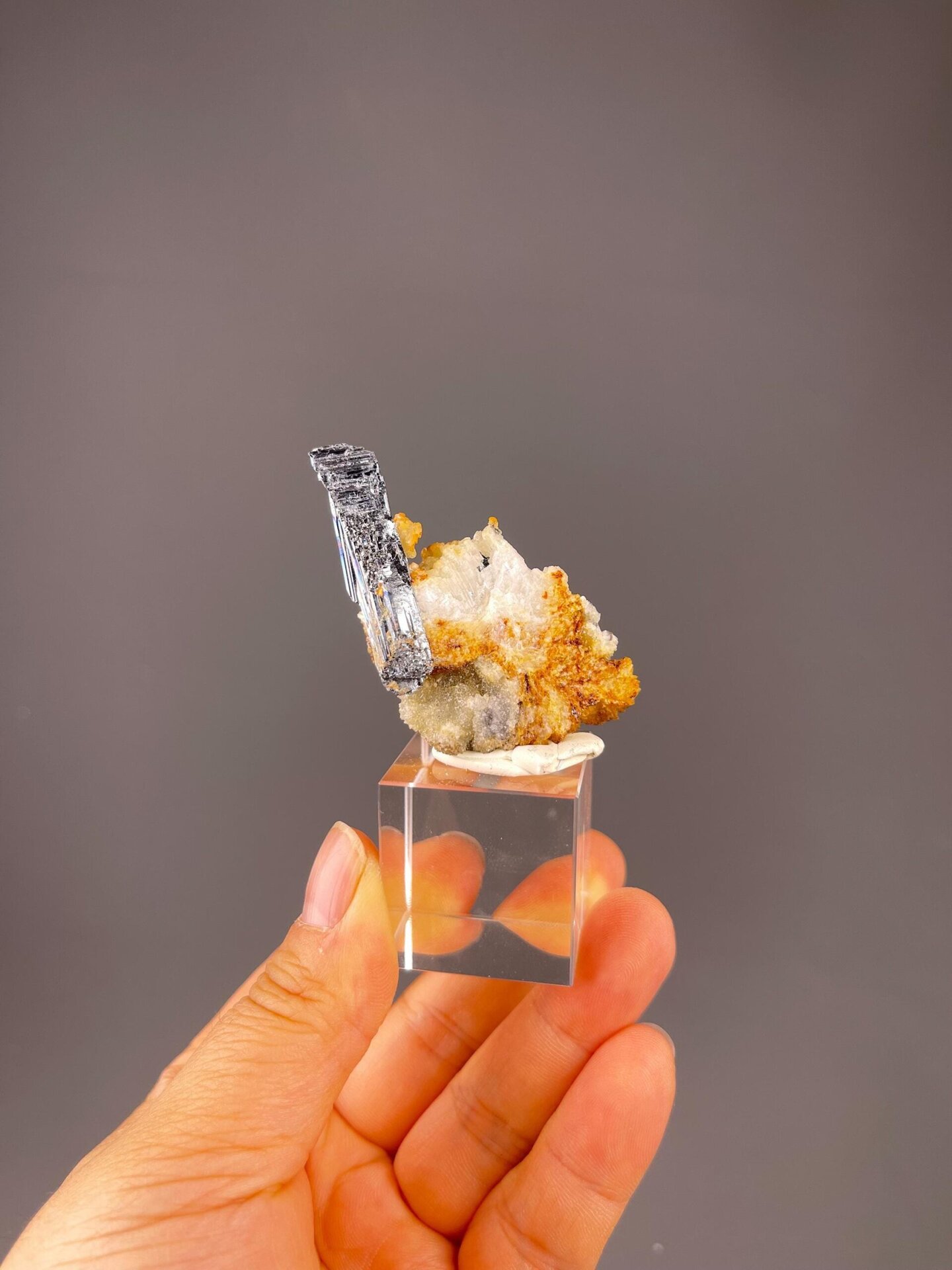 Side view of stibnite crystal on matrix from Hunan