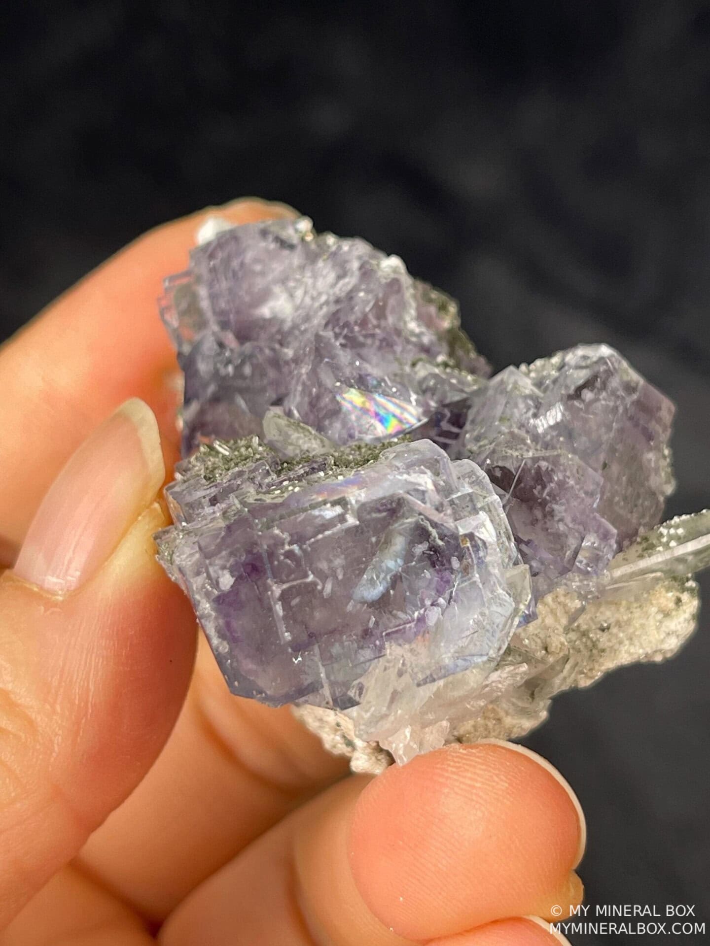 Radiant purple fluorite with interior window inclusion