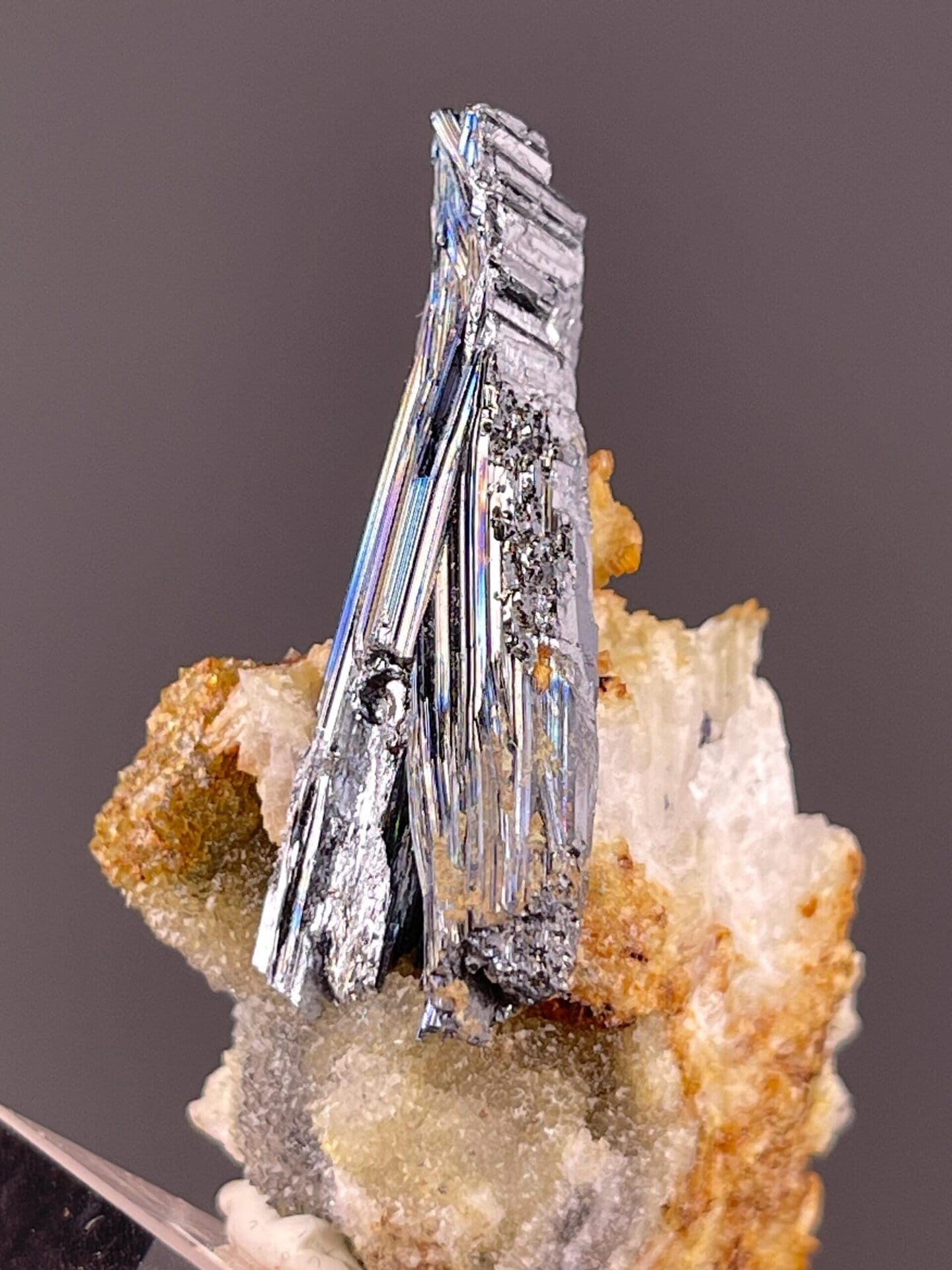 Top view of stibnite crystal on matrix from Hunan