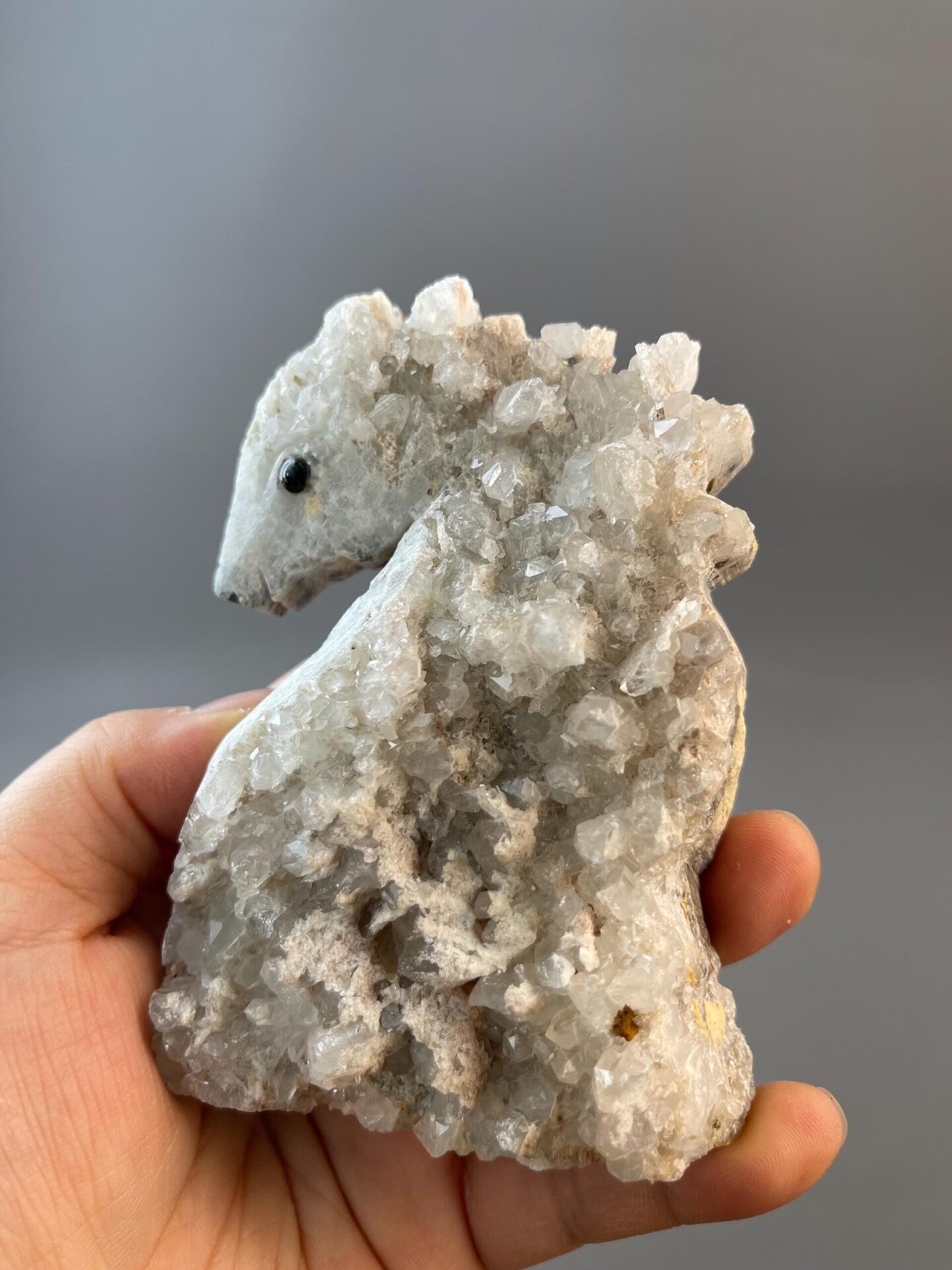 Quartz seahorse carving displaying polished surface finish