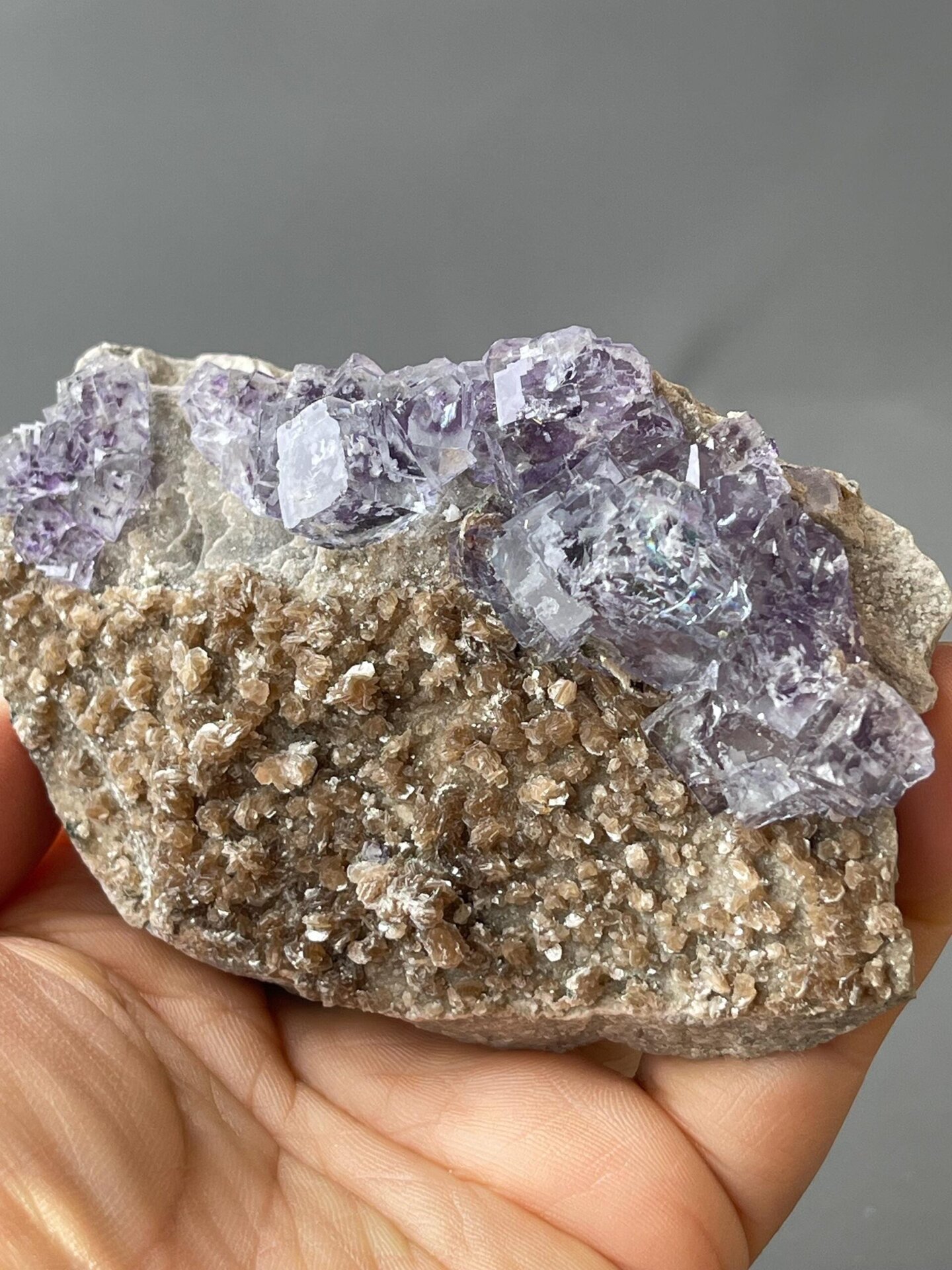 Purple phantom fluorite on mica base from Hunan, China
