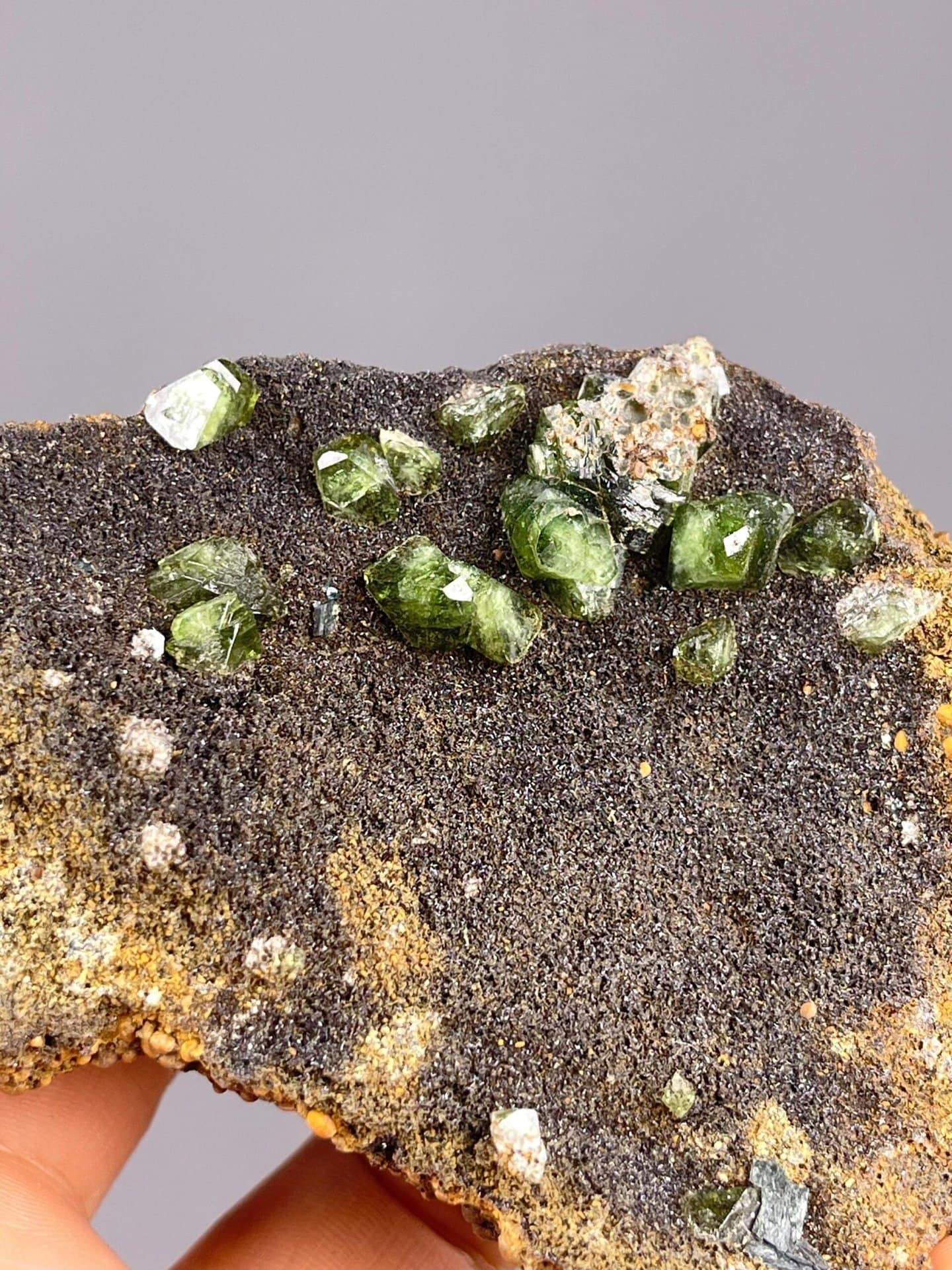 Side view of green andradite garnet cluster, Guangxi