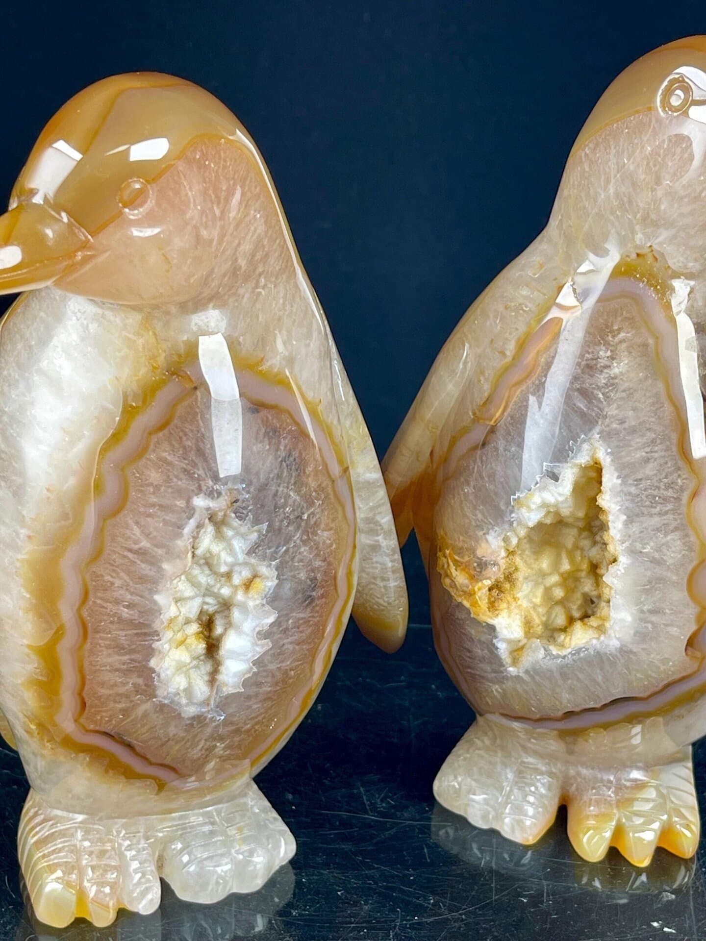 Hand-carved Brazilian agate penguin pair sculptures