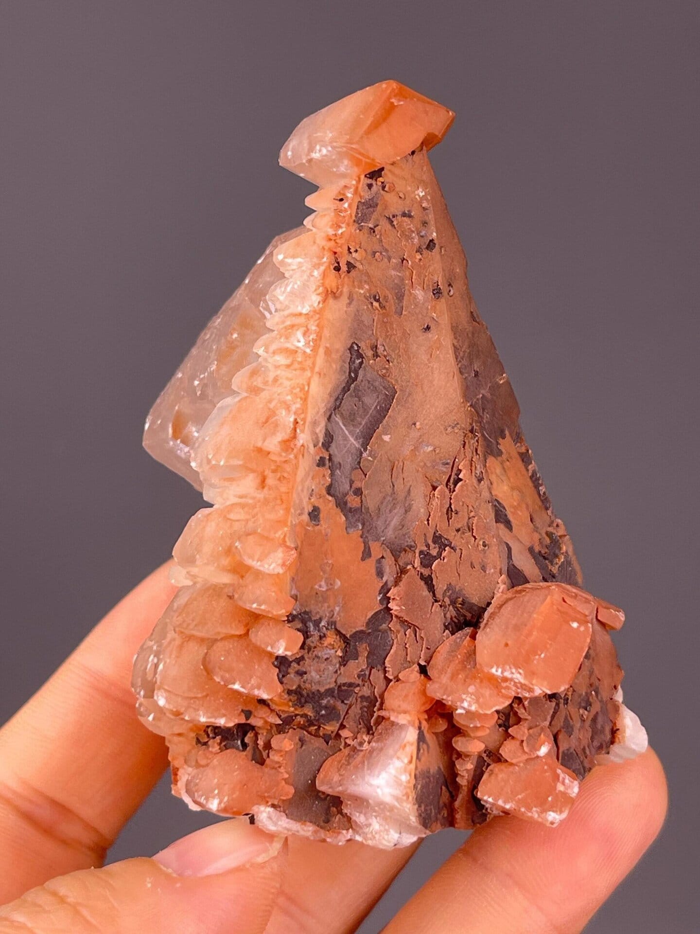 Side view of red-brown scalenohedral calcite tower, Hubei