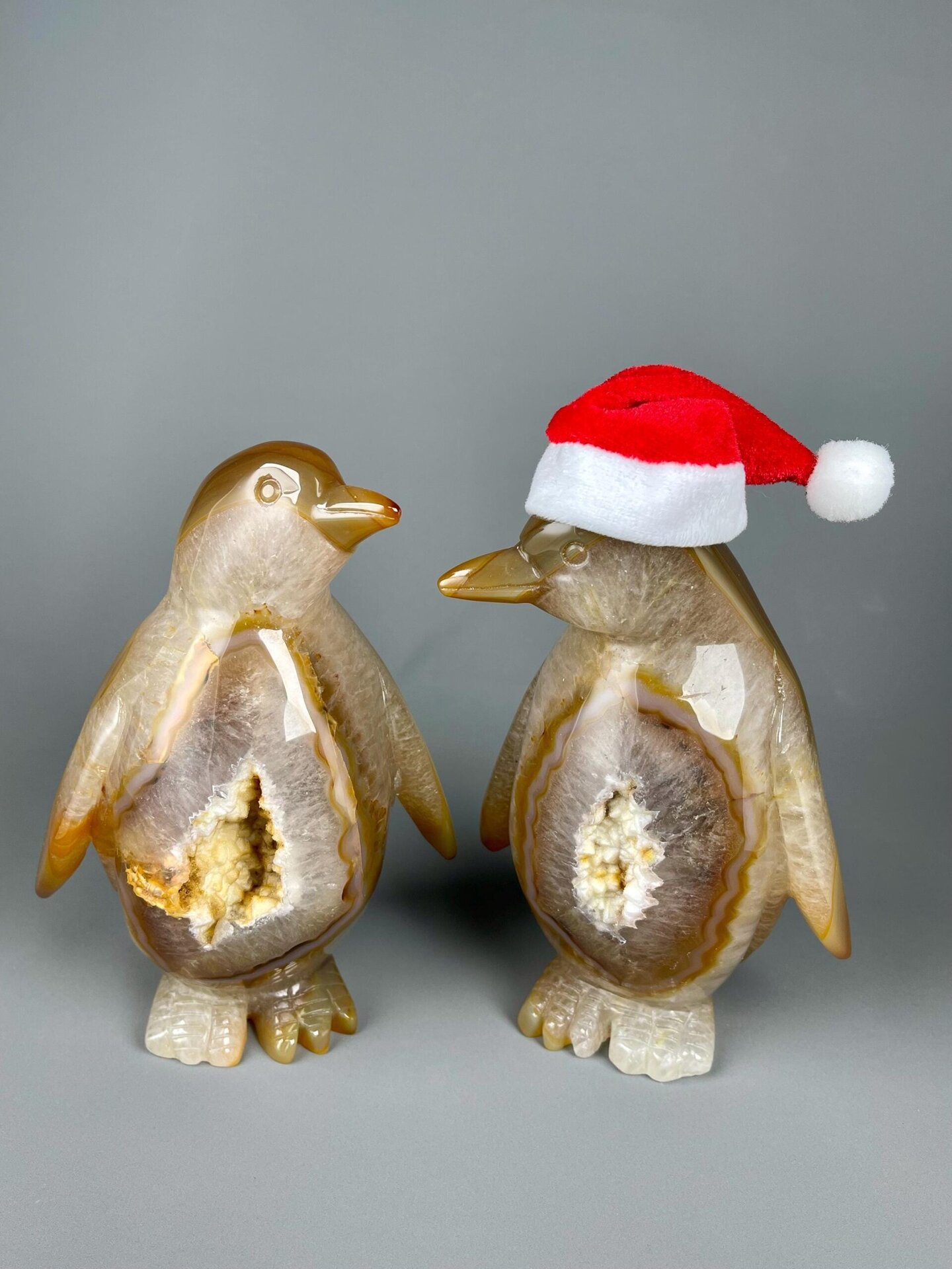 Close-up of natural agate banding on penguin sculptures