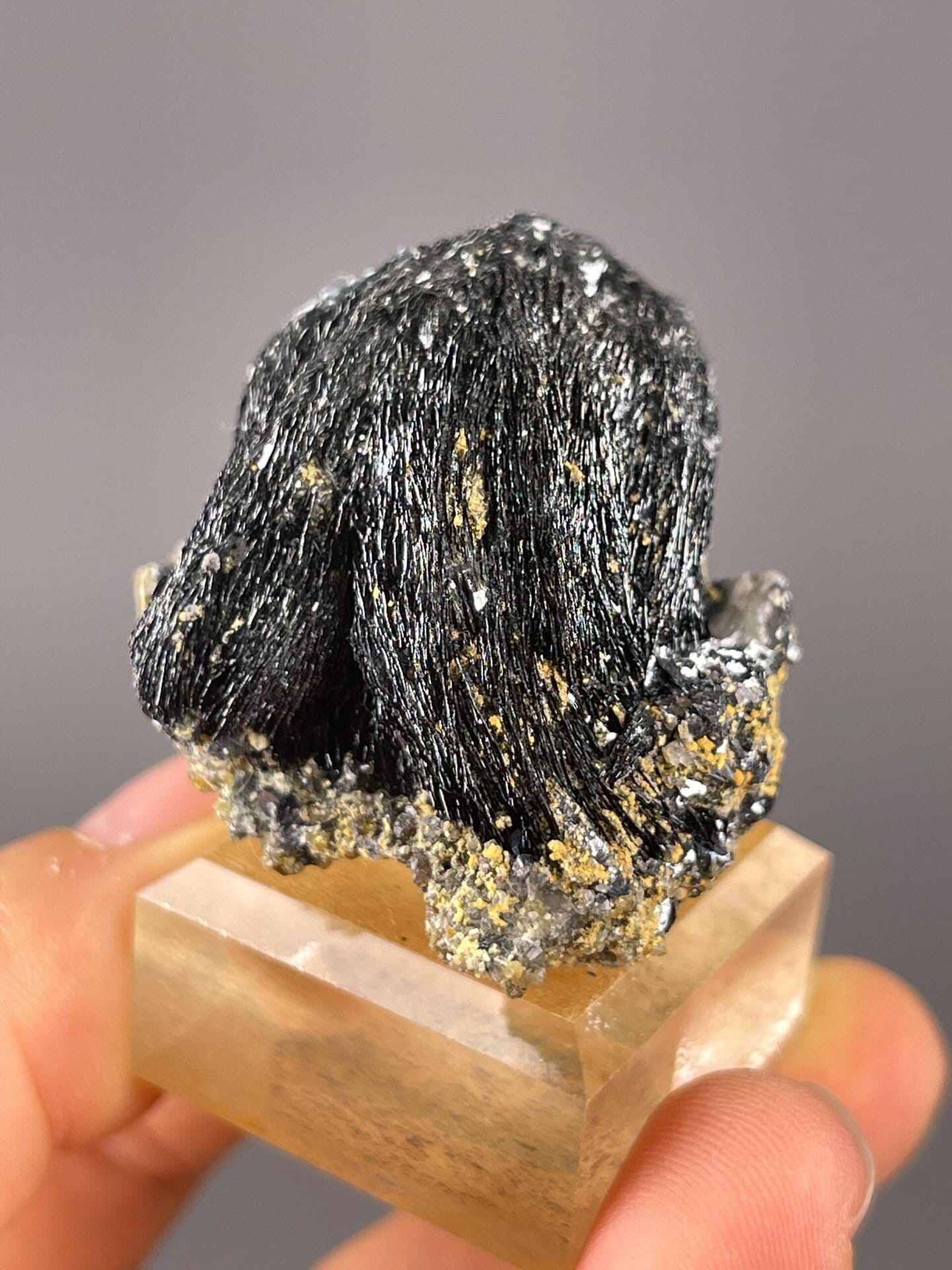 Close-up of metallic silver specular hematite crystal faces