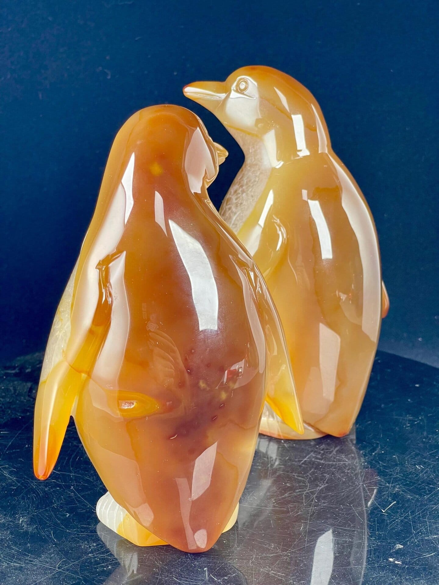 Brazilian agate penguin pair displaying waxy luster