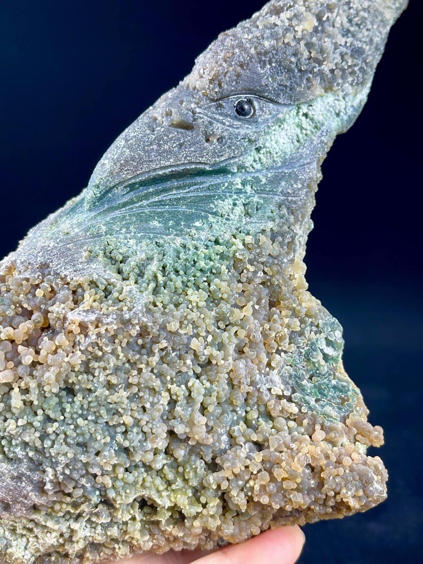 Hand-carved grape agate pterosaur sculpture from Indonesia