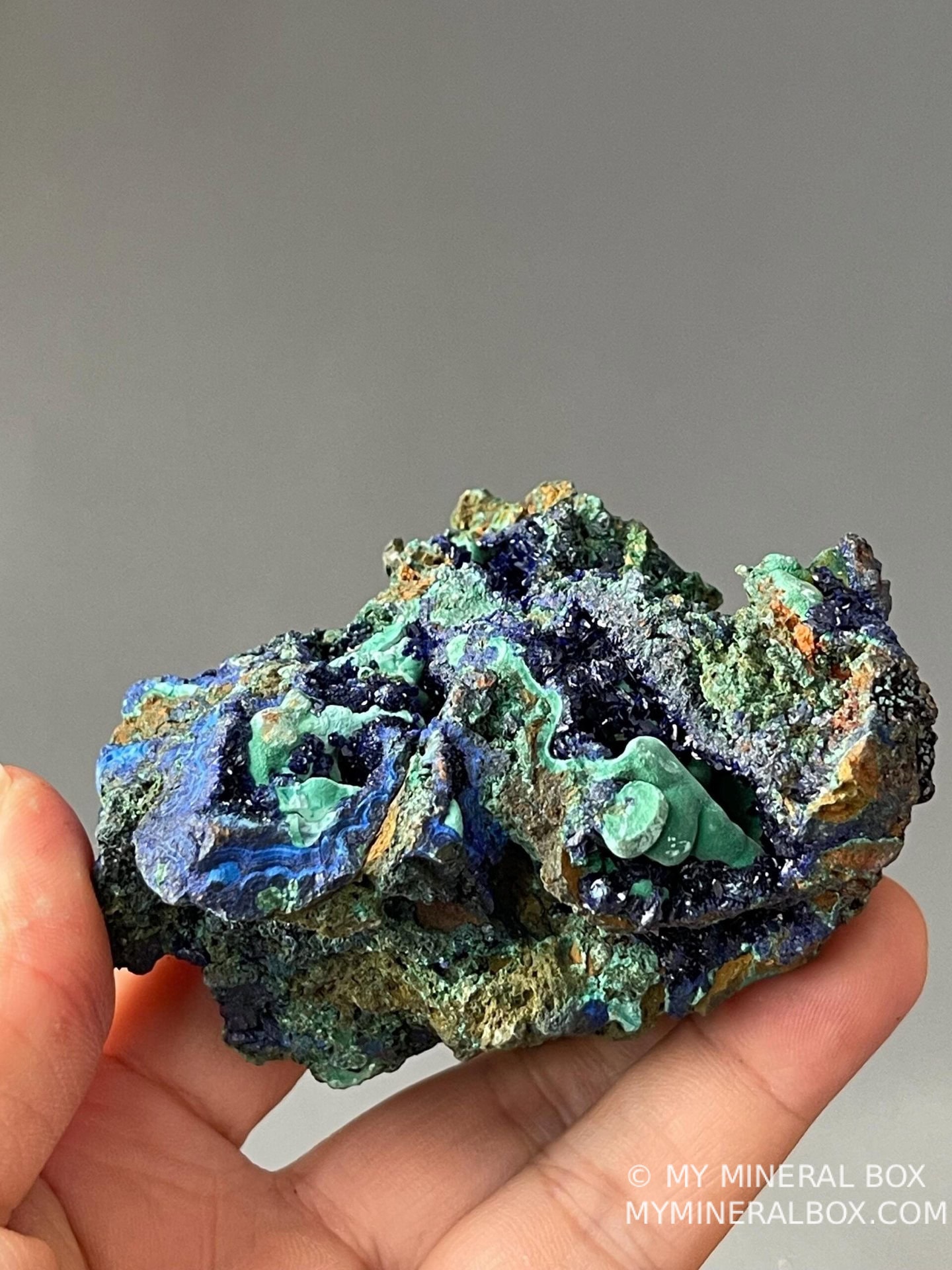 Vivid blue azurite crystal growth on malachite, China