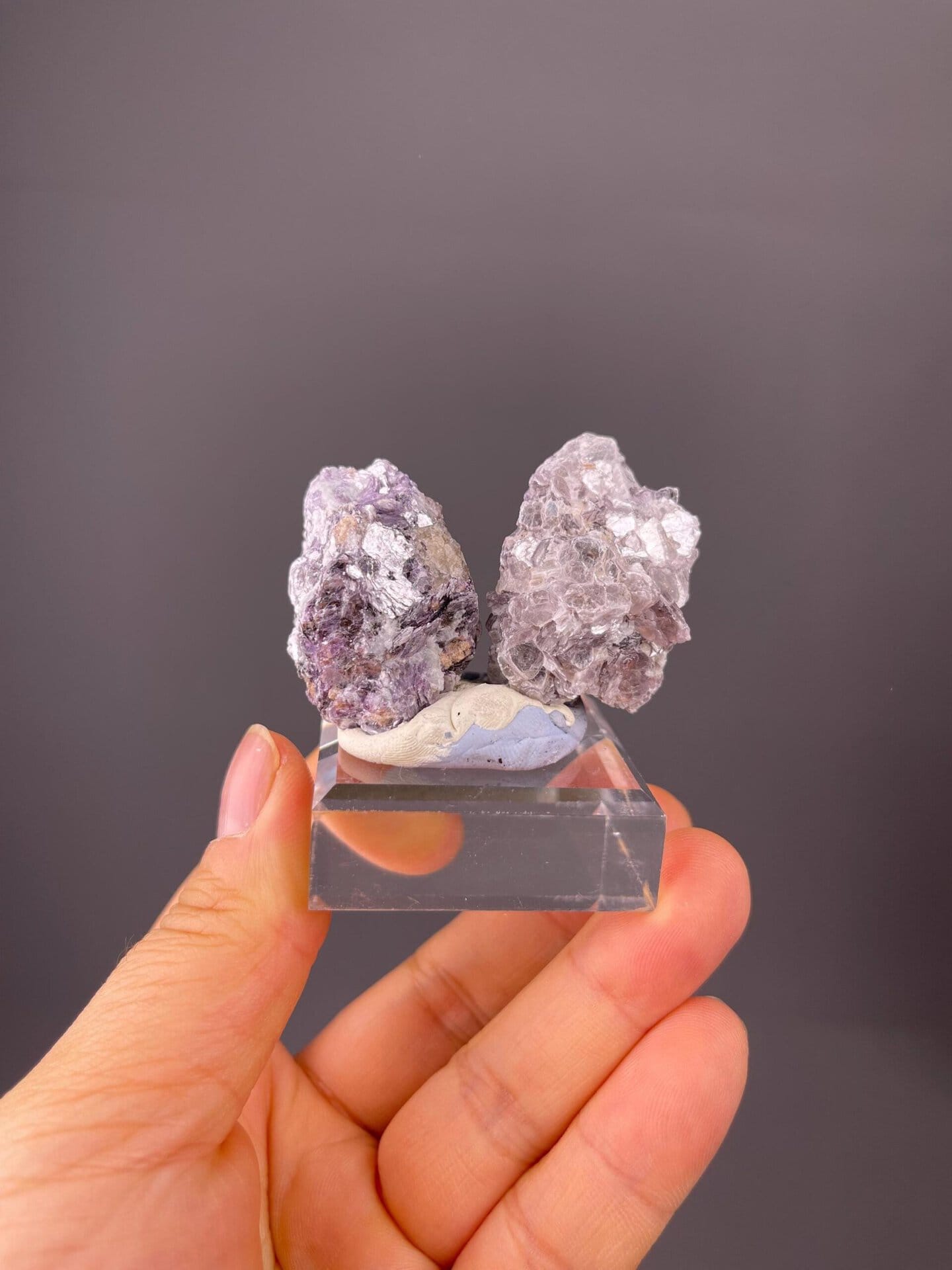 Paired mica specimens: silver plate and purple cluster from Sichuan